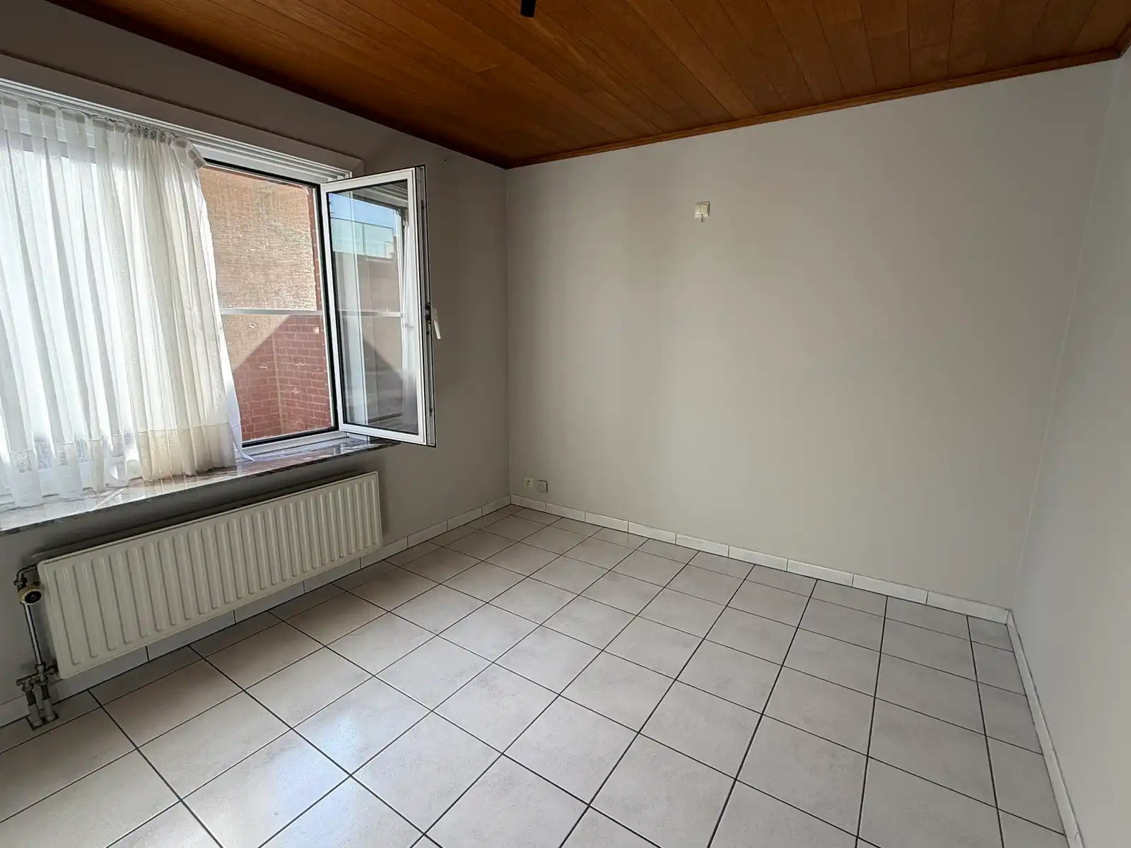 Gelijkvloers tweeslaapkamerappartement met staanplaats foto 7