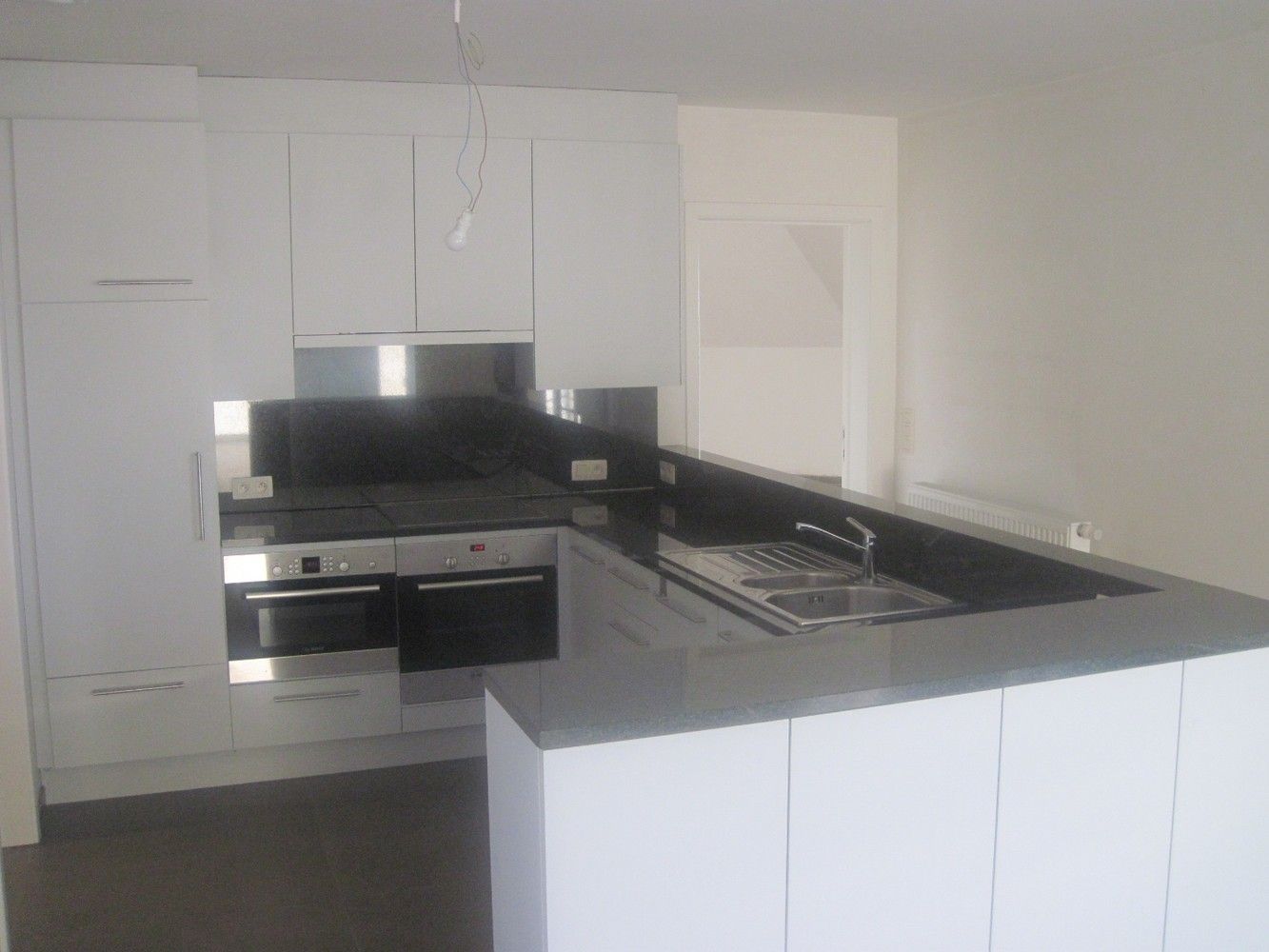Ruime penthouse met terras en autostaanplaats! foto 9