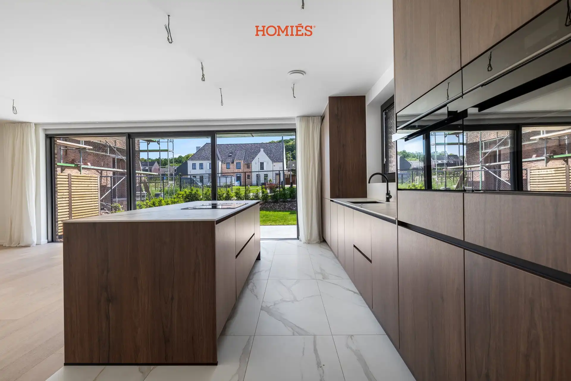 Luxe 3-slaapkamerappartement met privatief tuintje foto 3