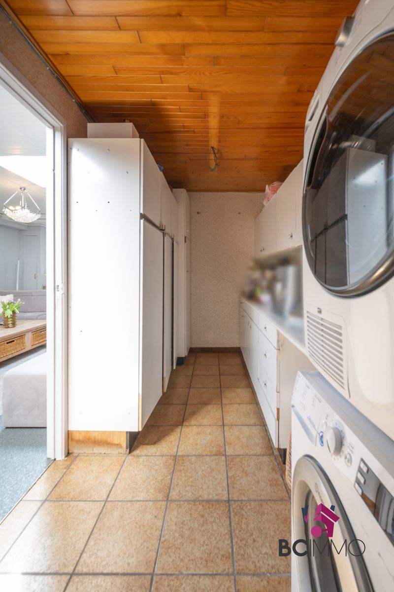 Instapklare gelijkvloerse woning met 3 slaapkamers, 2 badkamers, veranda en tuin foto 18