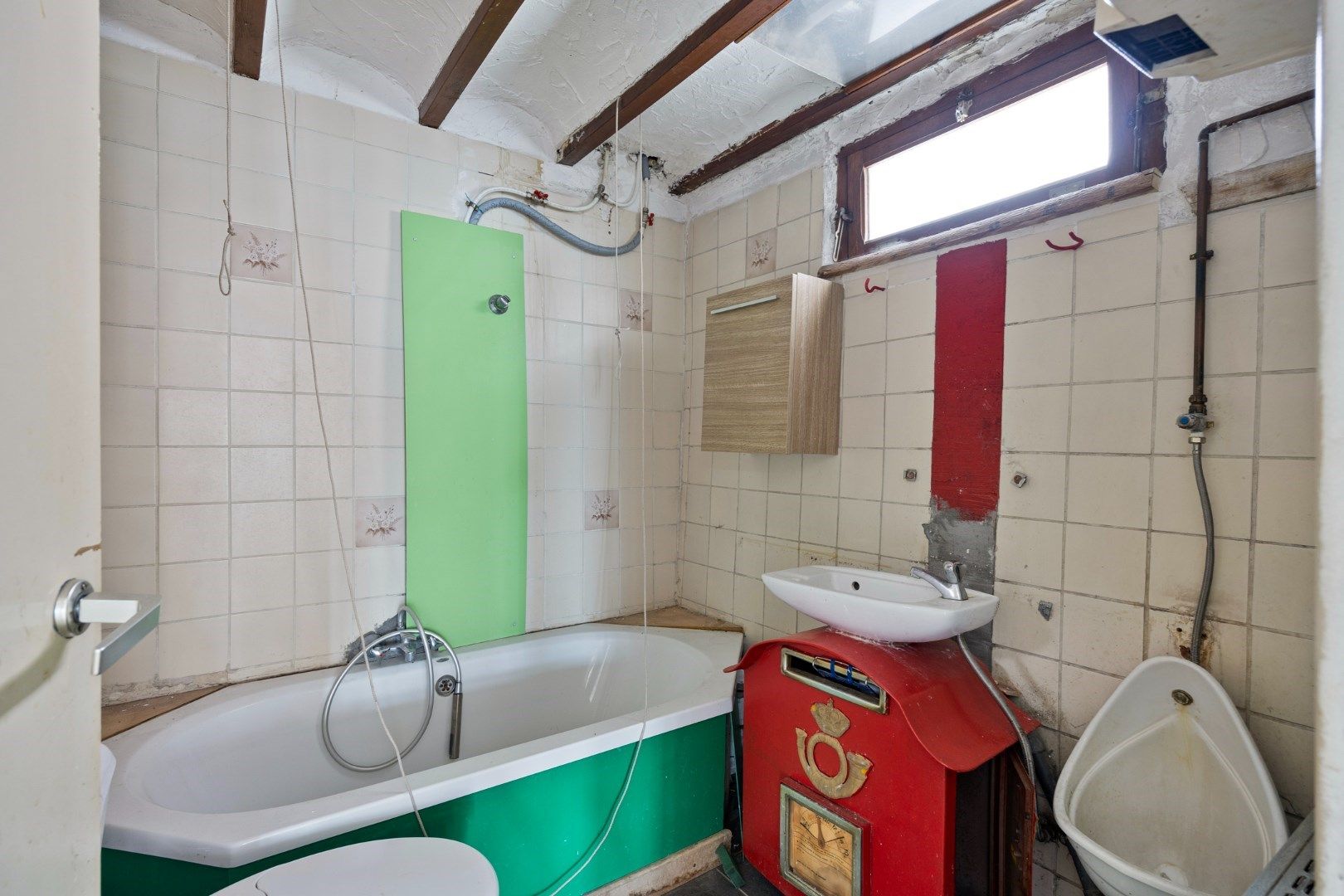 Halfopen hoekwoning met garage en dakterras op toplocatie in Kessel-Lo – renovatieproject met veel potentieel foto 7