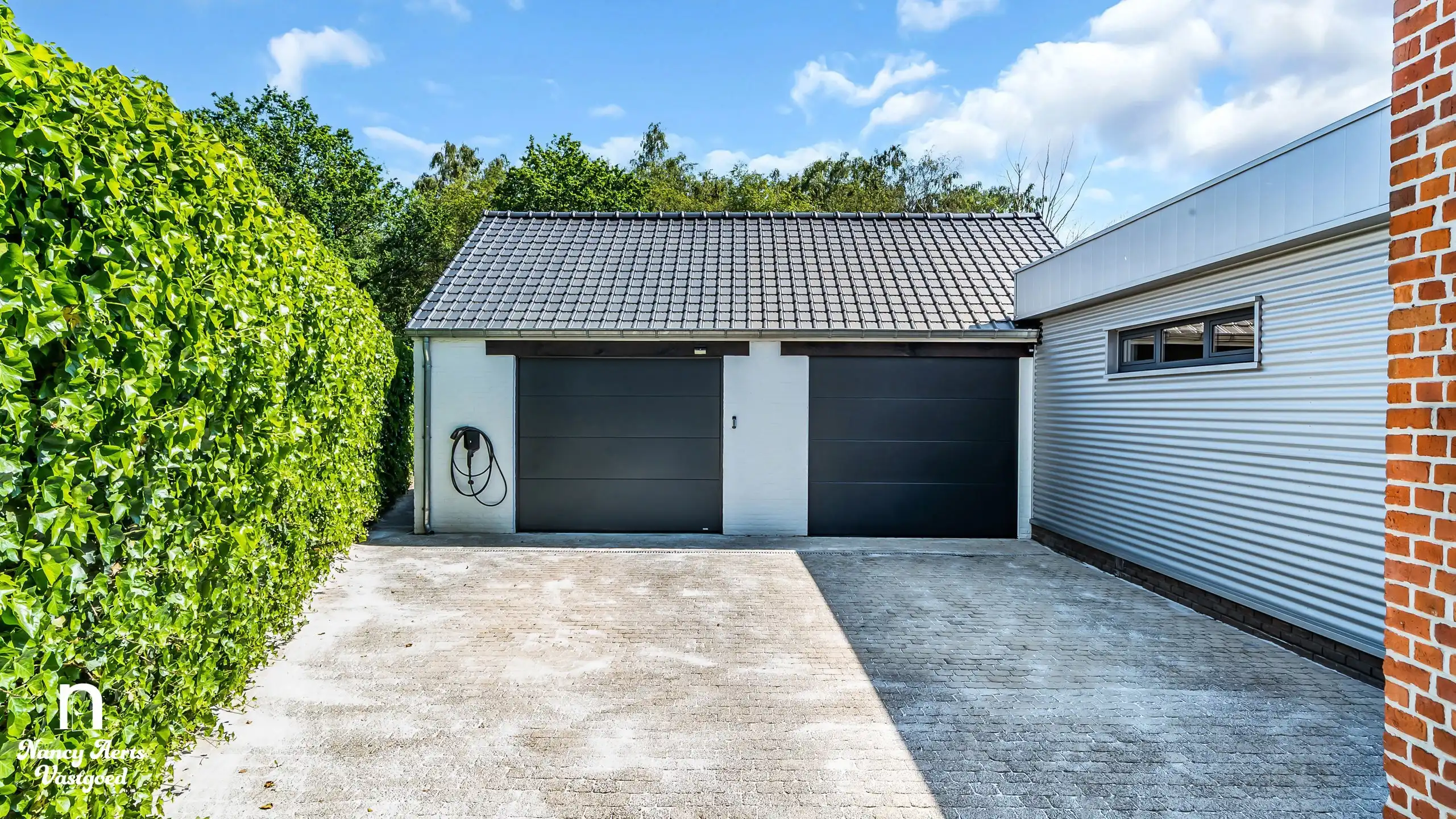 Luxe villa met karakter en hedendaags comfort in het groen foto 33