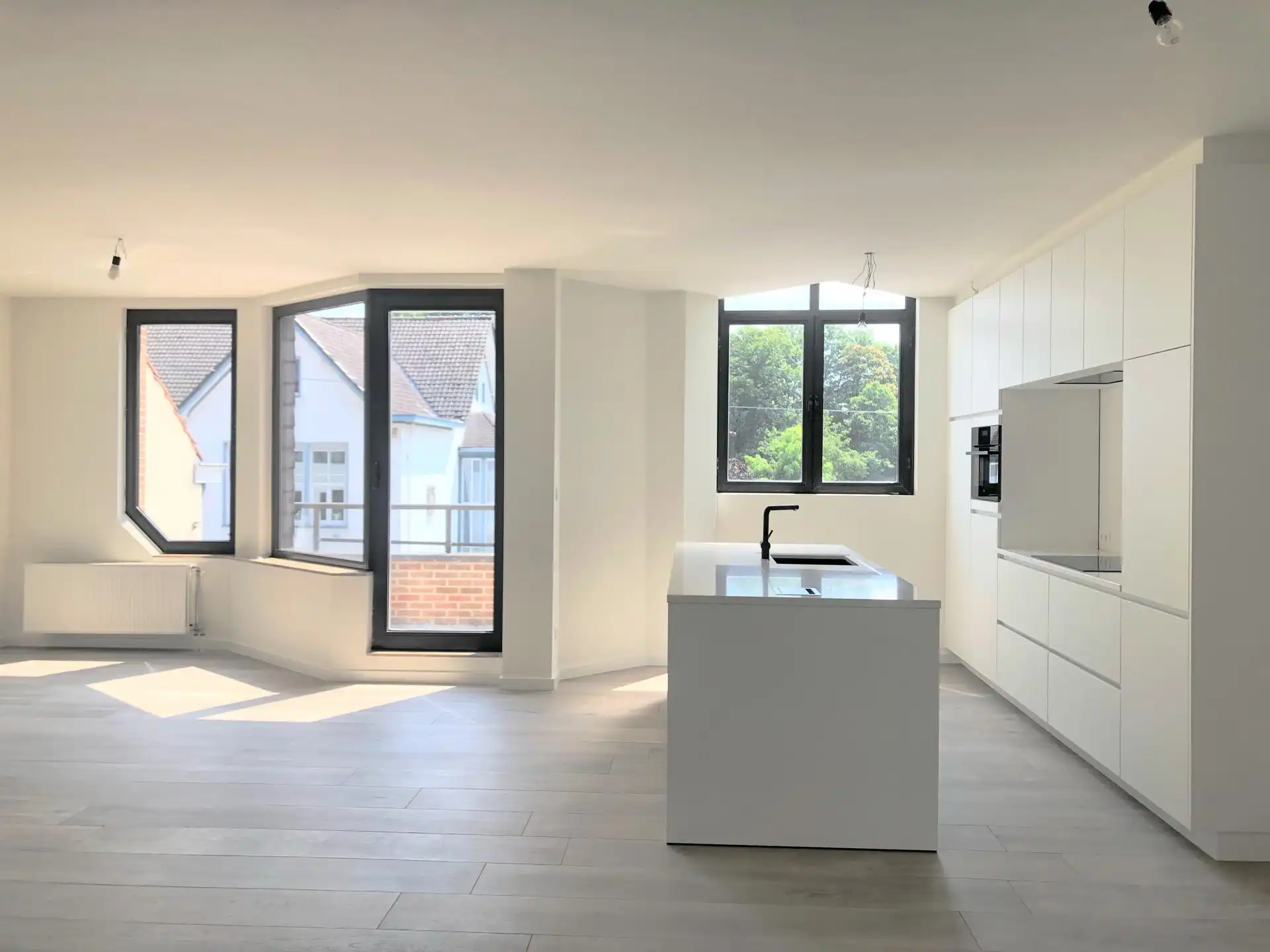 Gerenoveerd appartement te huur op de tweede verdieping in het centrum van Schilde! foto 5