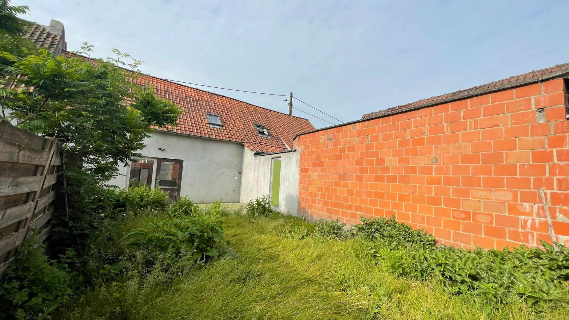 Grote woning met 2 kamers en zonnige tuin foto 10