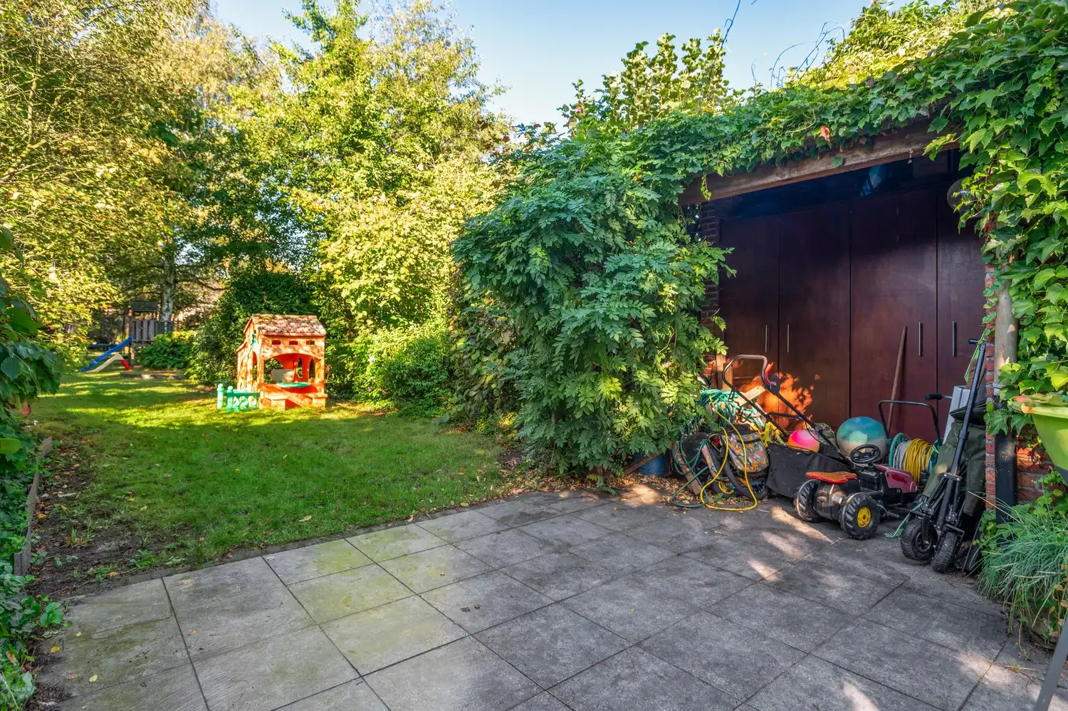 Super gezellige woning met prachtige ruime tuin en 3 slpks te Hoevenen! foto 24