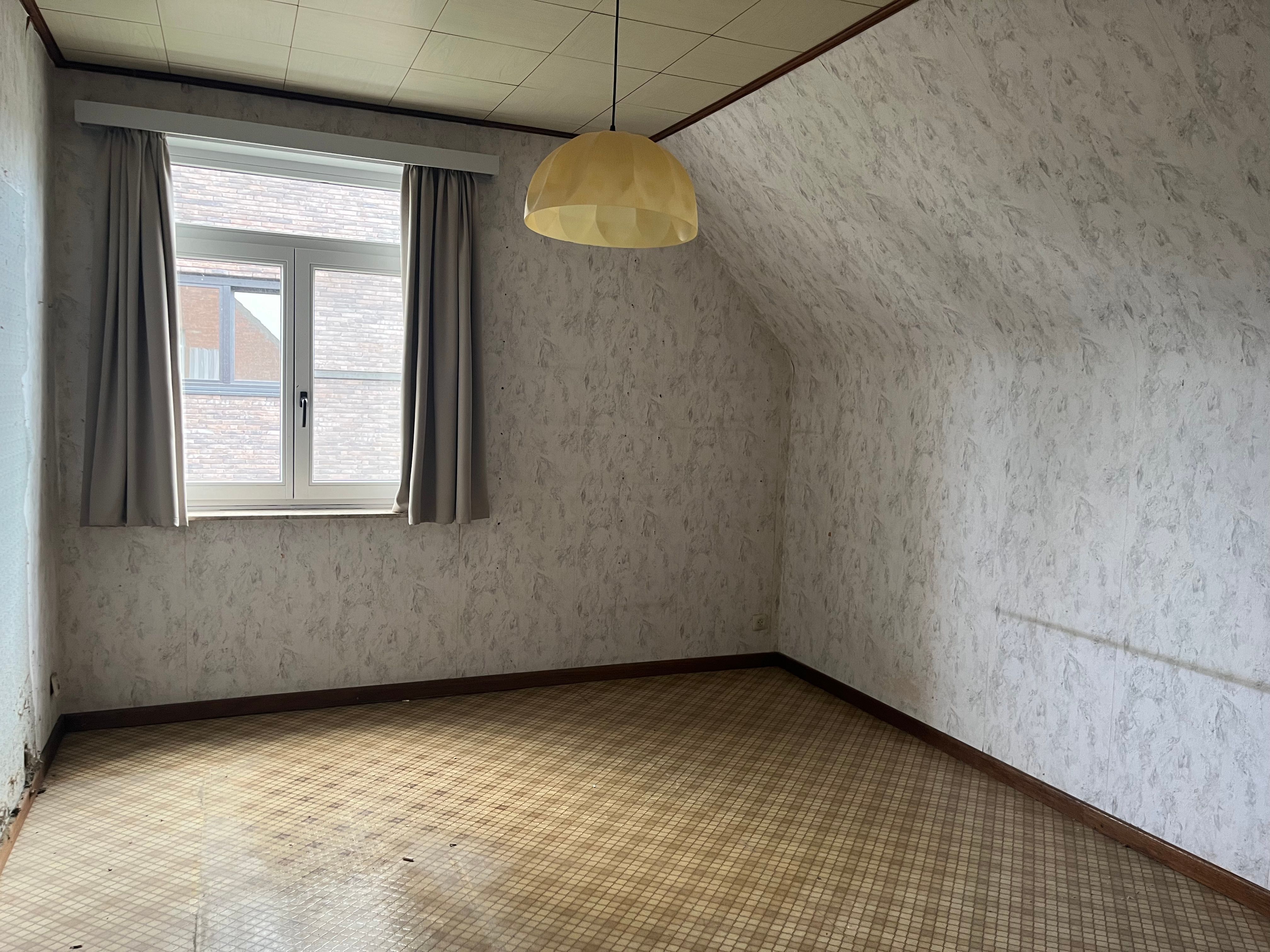 Te renoveren open bebouwing met karakter en ruime tuin. foto 14