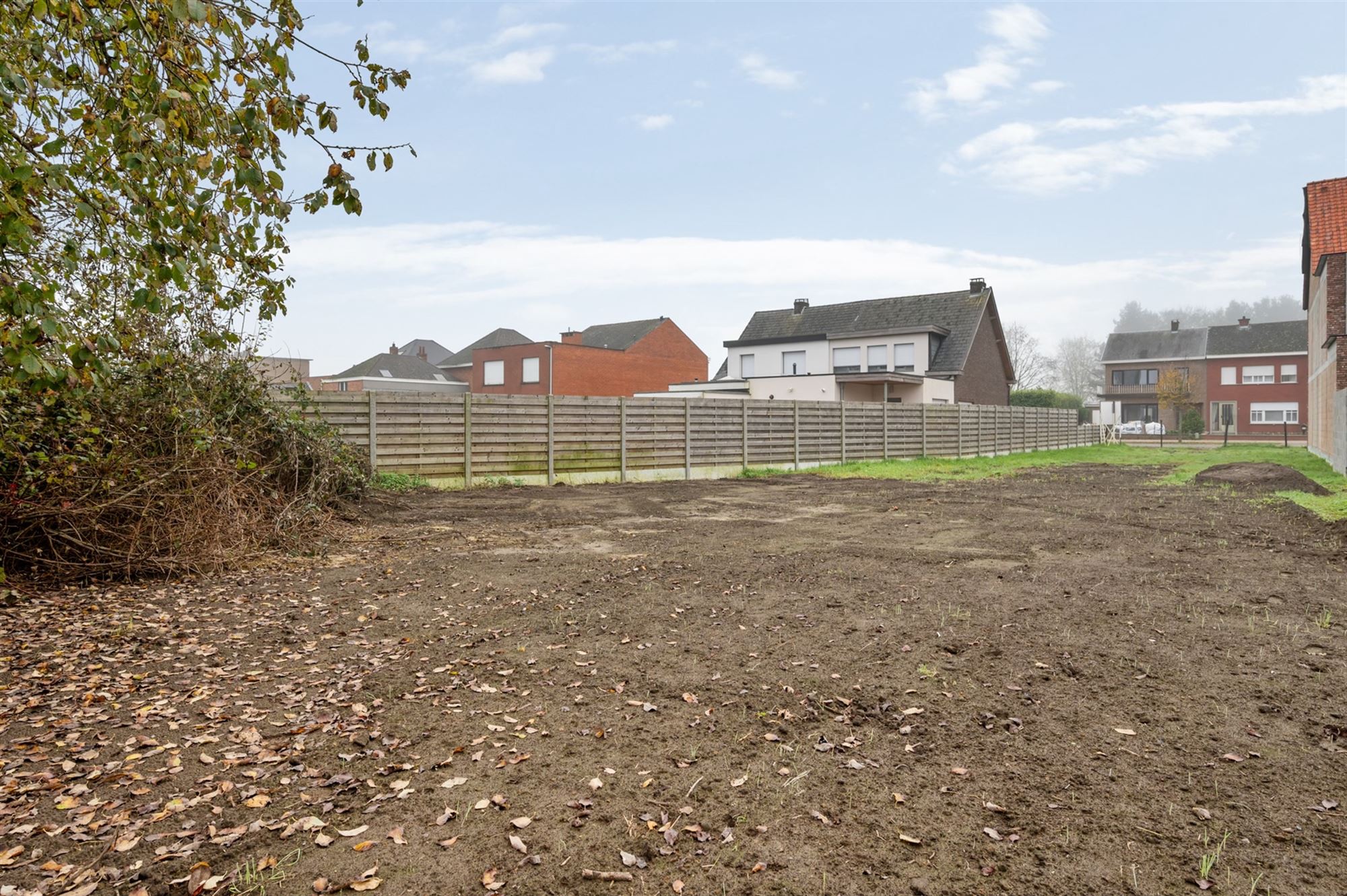 Perceel bouwgrond (650 m2) voor half open bebouwing niet ver van het centrum foto 12