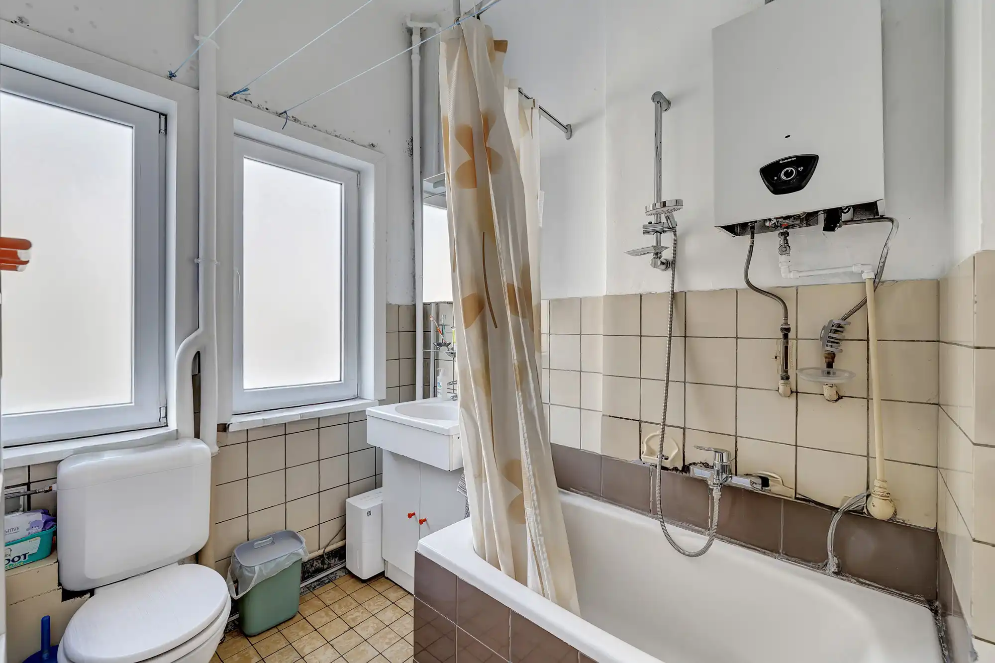 Woning ingericht in 3 appartementen te koop in Anderlecht foto 16