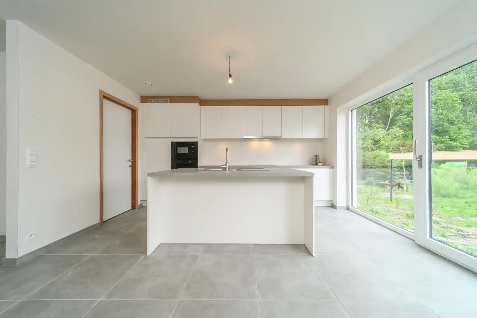 Gesloten nieuwbouwwoning nabij het dorpscentrum Haaltert foto {{pictureIndex}}