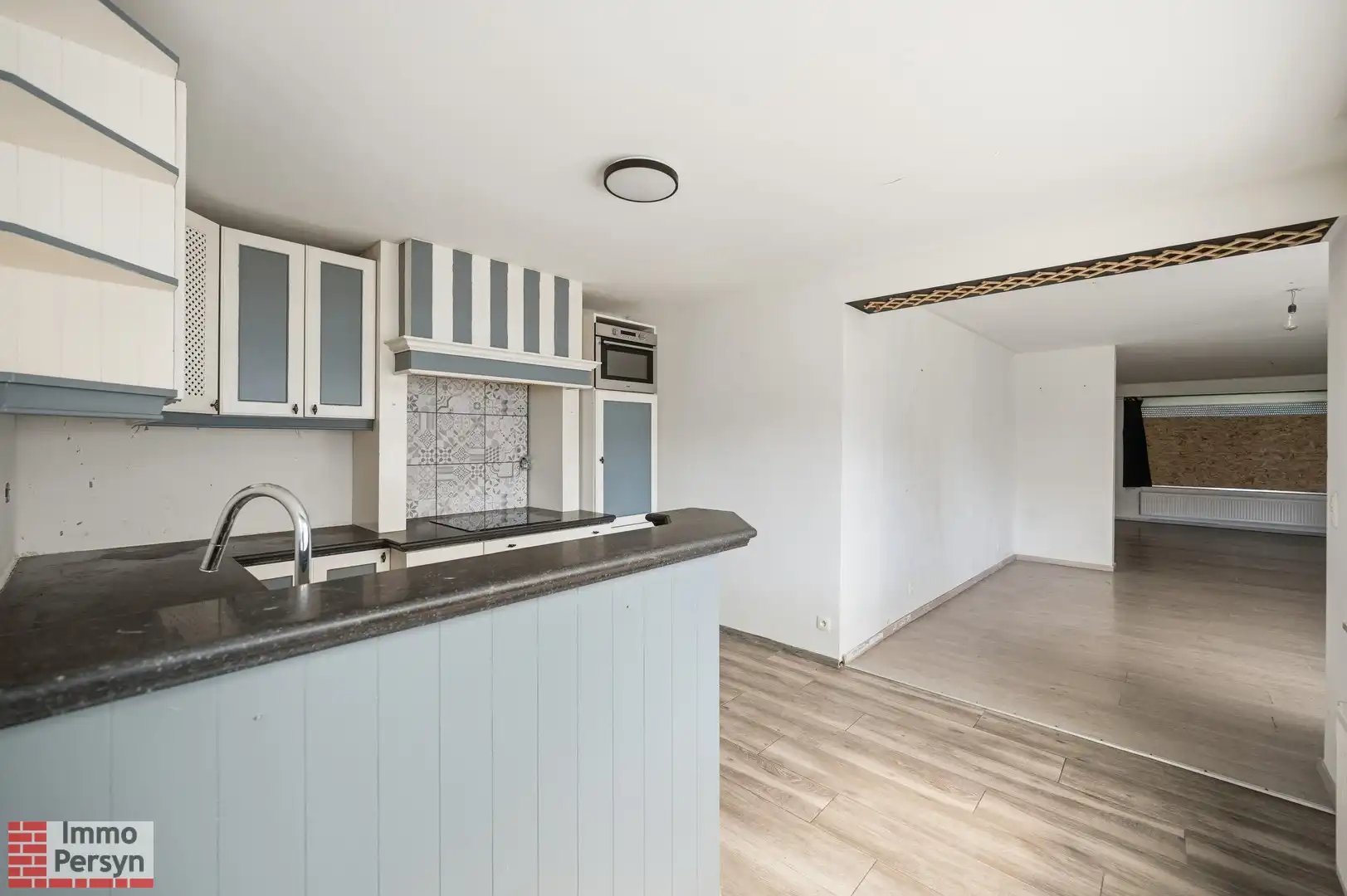 Ruime af te werken woning met nieuw dak, vernieuwde elektriciteit en diepe tuin  (EPC D) foto 6