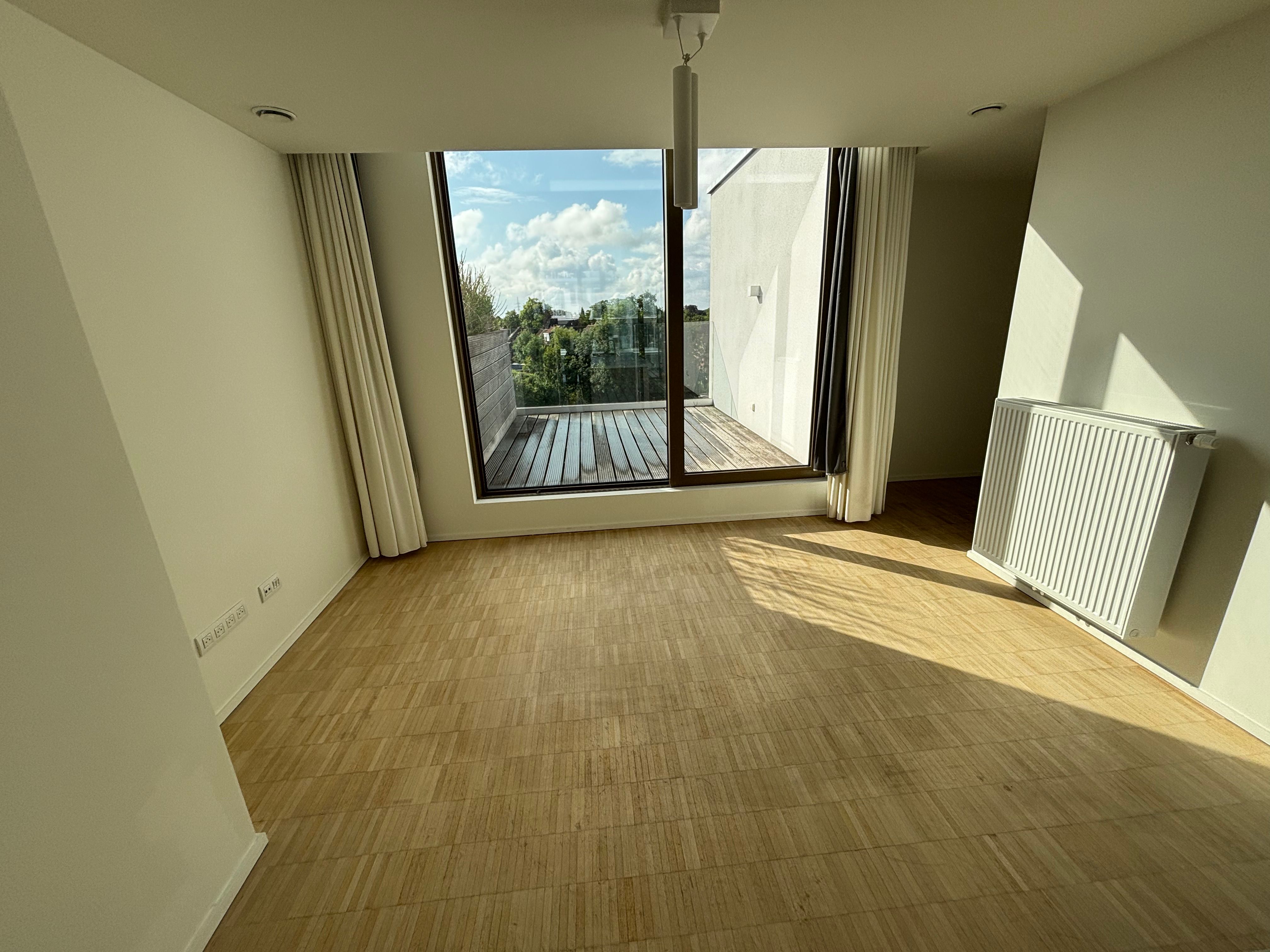Lichtrijke, moderne en energiezuinige penthouse te koop in Roeselare foto 7