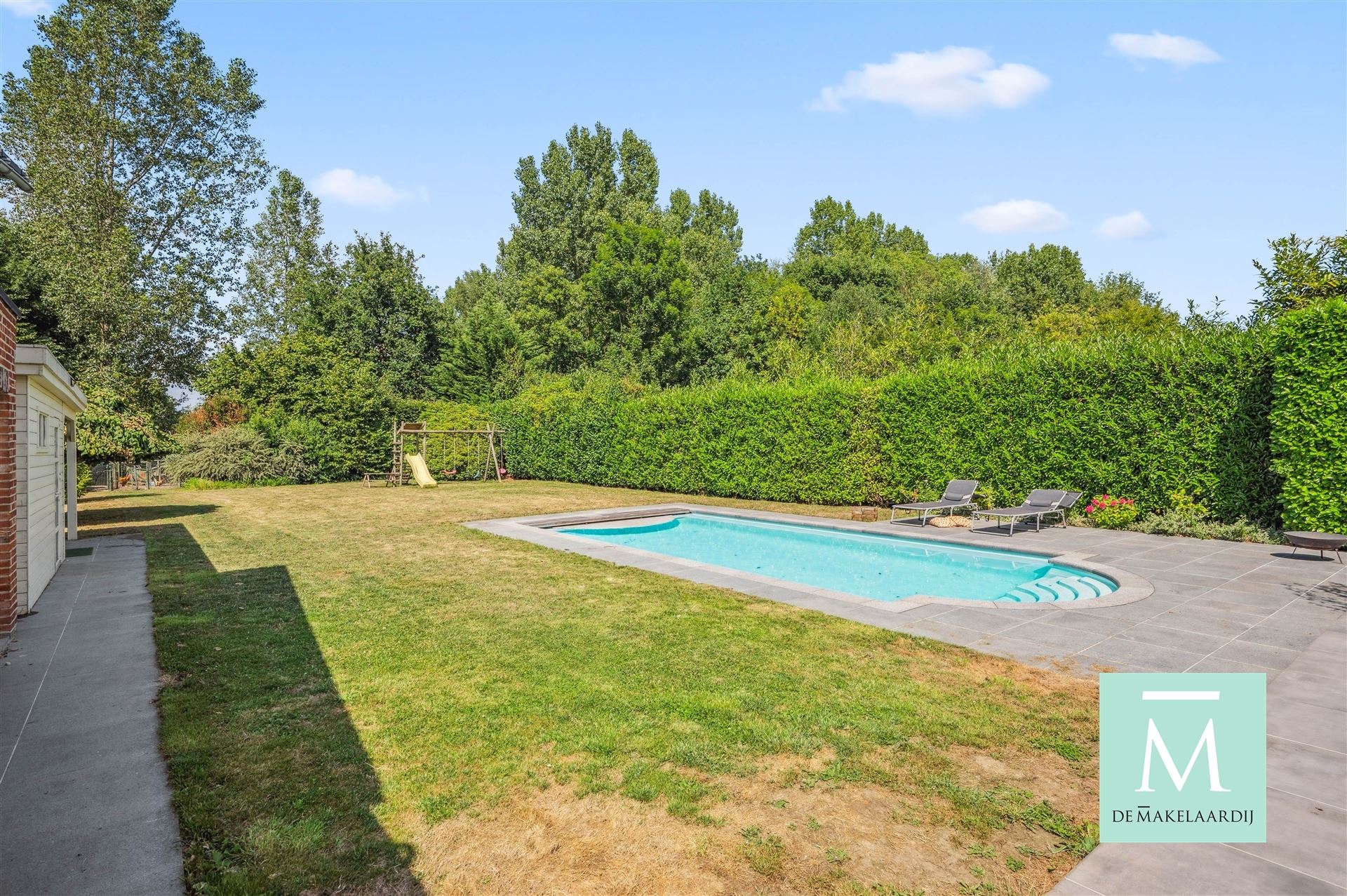 Ruime villa met aparte studio en prachtige tuin met zwembad foto 33
