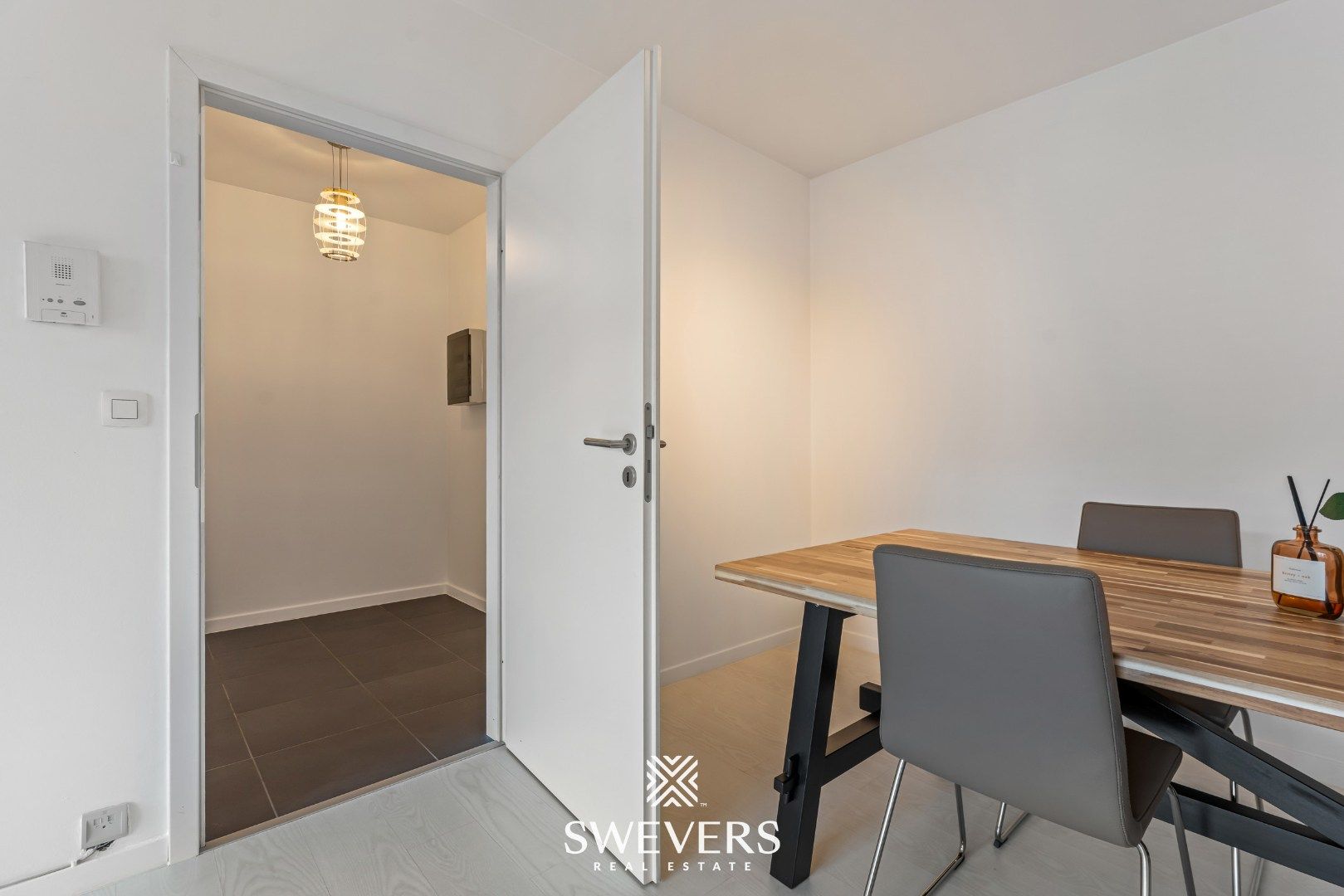 Instapklaar en energiezuinig 2-slaapkamerappartement in het centrum van Heppen foto 10