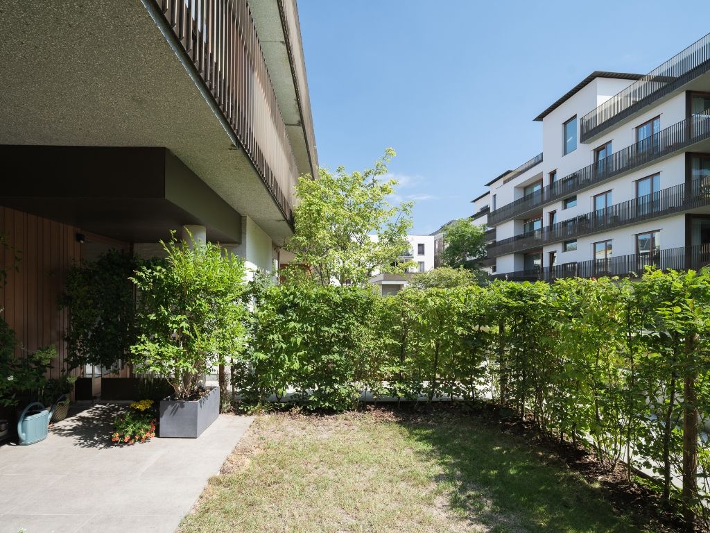 Hedendaags gelijkvloers appartement met één slaapkamer en stadstuin, gelegen in de voormalige brandweerkazerne en de vroegere kunstacademie, midden in het historisch hart van Gent. foto 10