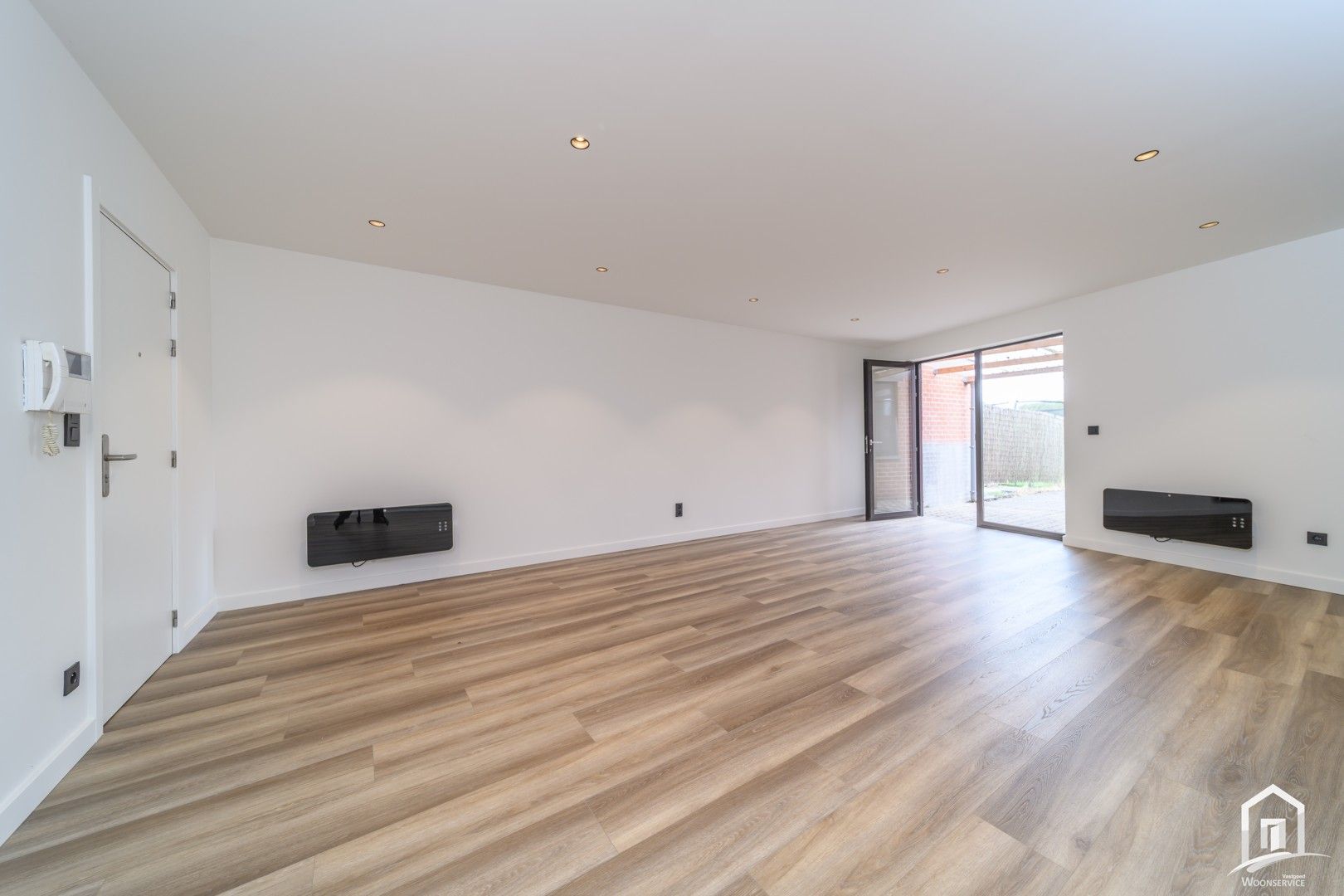 Totaal gerenoveerd gelijkvloers-appartement met tuintje foto 5