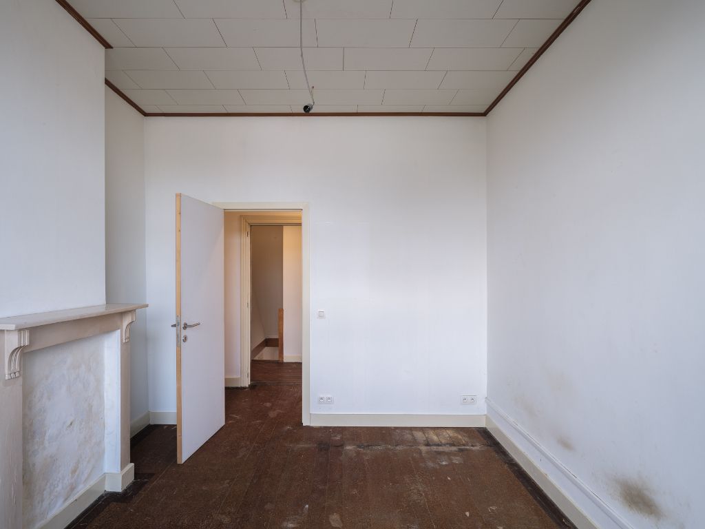 Te renoveren woning met atelier/loods, ruime tuin en bijzonder veel potentieel op een boogscheut van het stadscentrum. foto 17