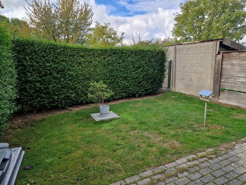 Prachtig gelijkvloersappartement met 2 slaapkamers,  tuin en garage foto 13