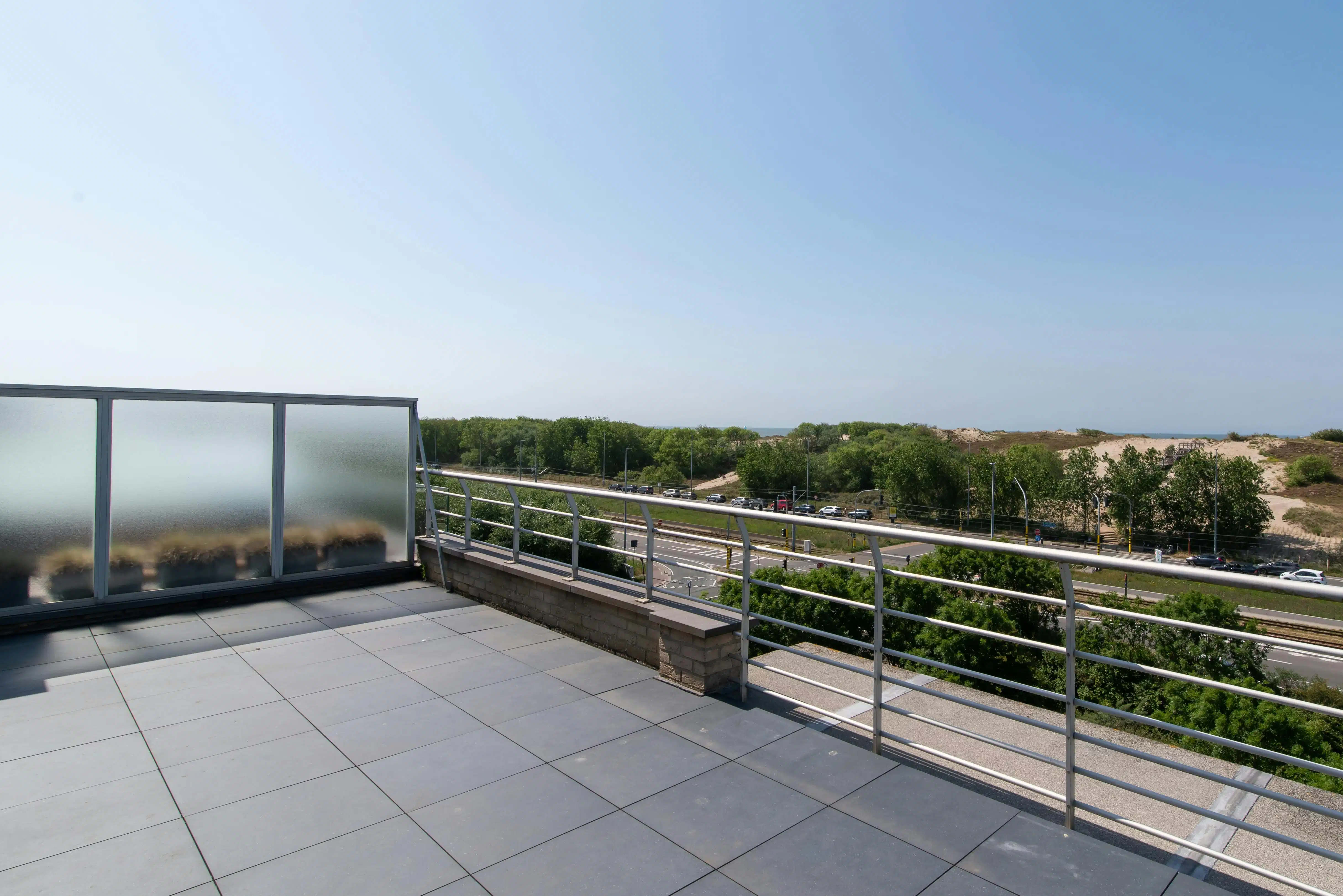 Exclusief penthouse te Bredene met duinen- en zeezicht foto 2