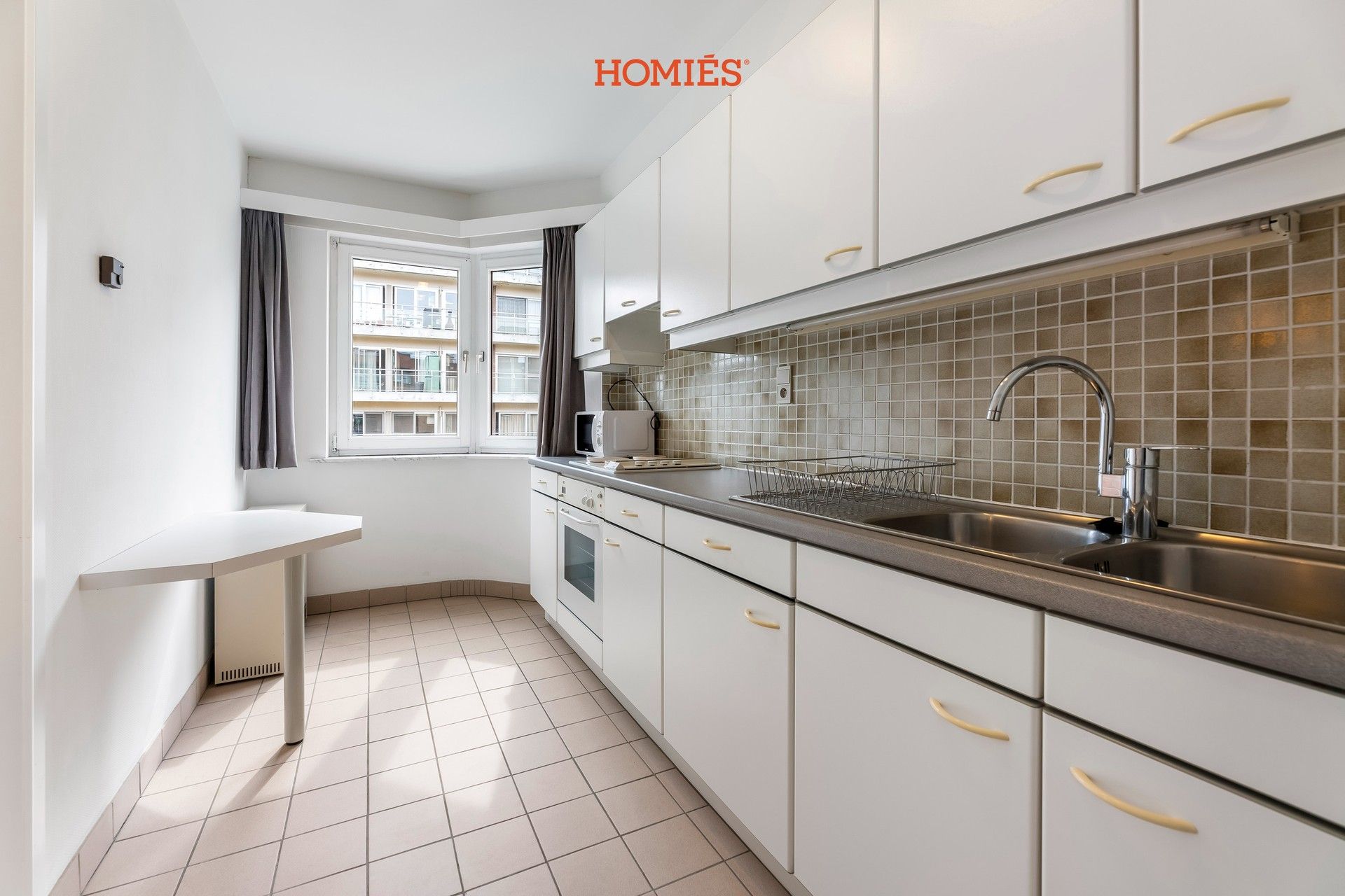 Bemeubeld drieslaapkamerappartement in het hartje van Leuven foto 7