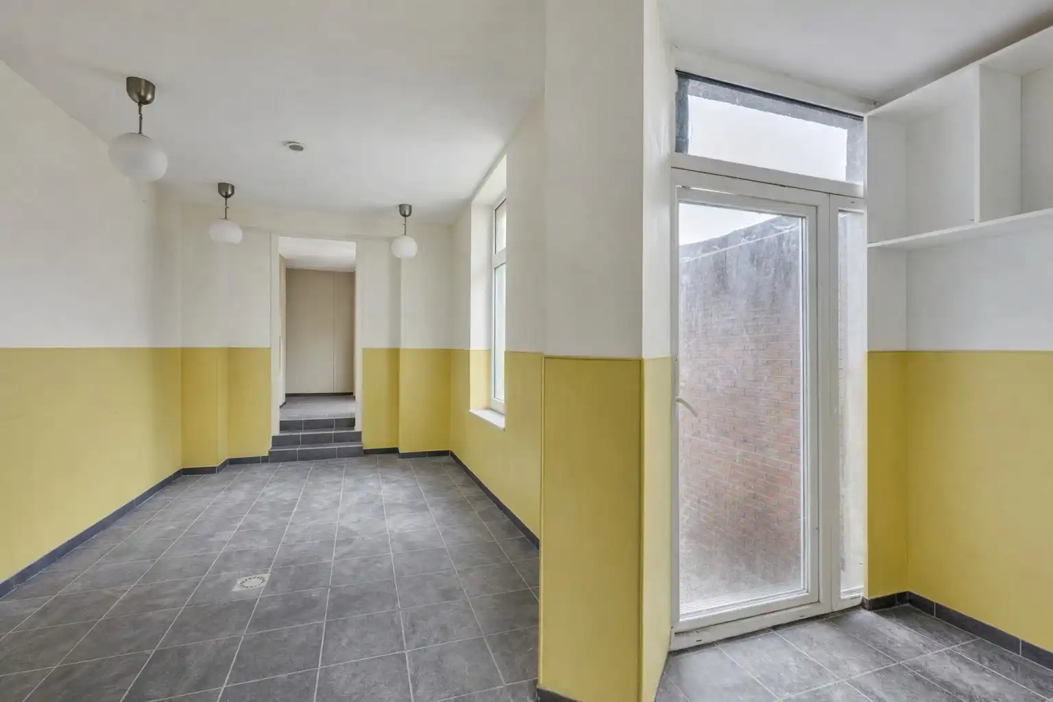 Gerenoveerd handelshuis op strategische locatie te Dilbeek! foto 7