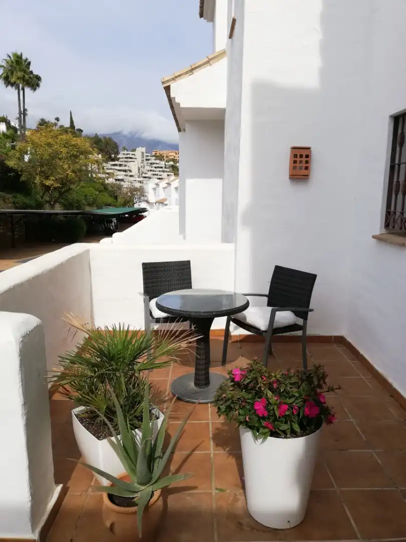 Gezellige duplex met zicht over de Nueva Andalucia vallei naar de Middellandse zee. foto 39