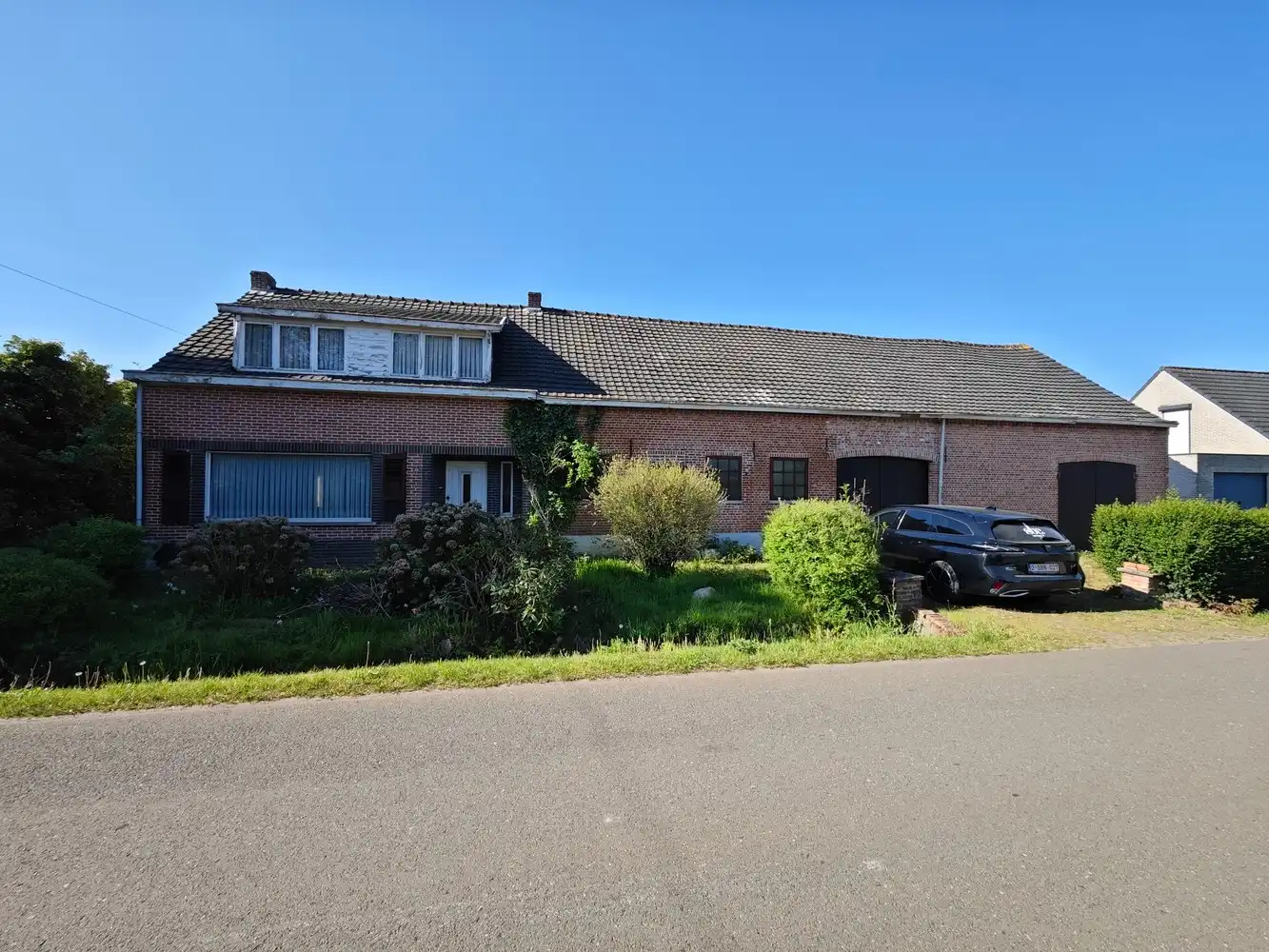 Te renoveren langgevelhoeve + langsliggend perceel bouwgrond voor open bebouwing. foto 19