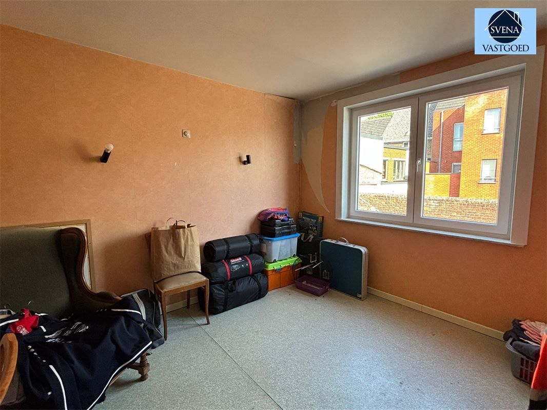 TE RENOVEREN WONING NABIJ CENTRUM MET 4 KAMERS. foto 7