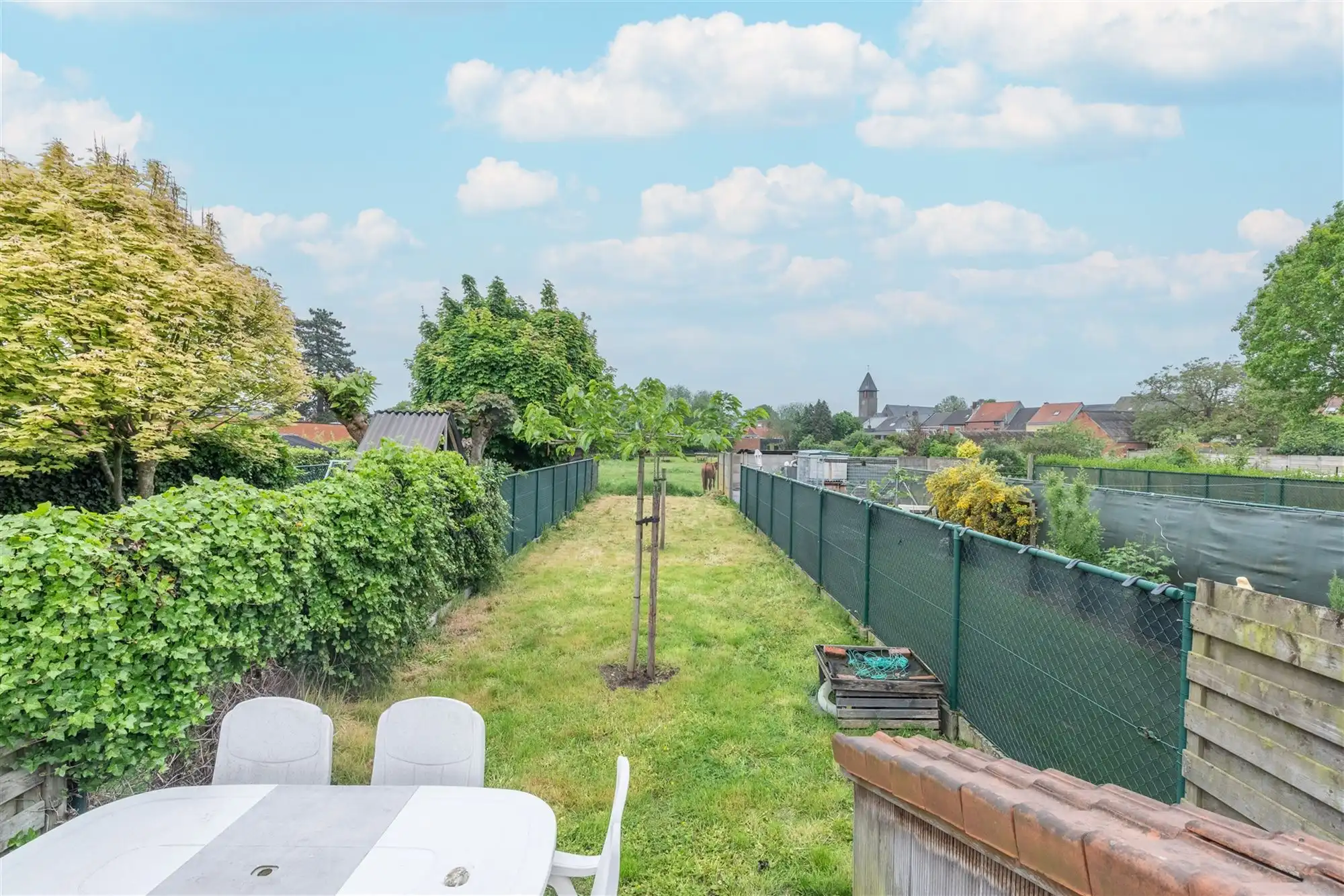 rustig gelegen gezinswoning met 4 slpks, garage en tuin foto 12
