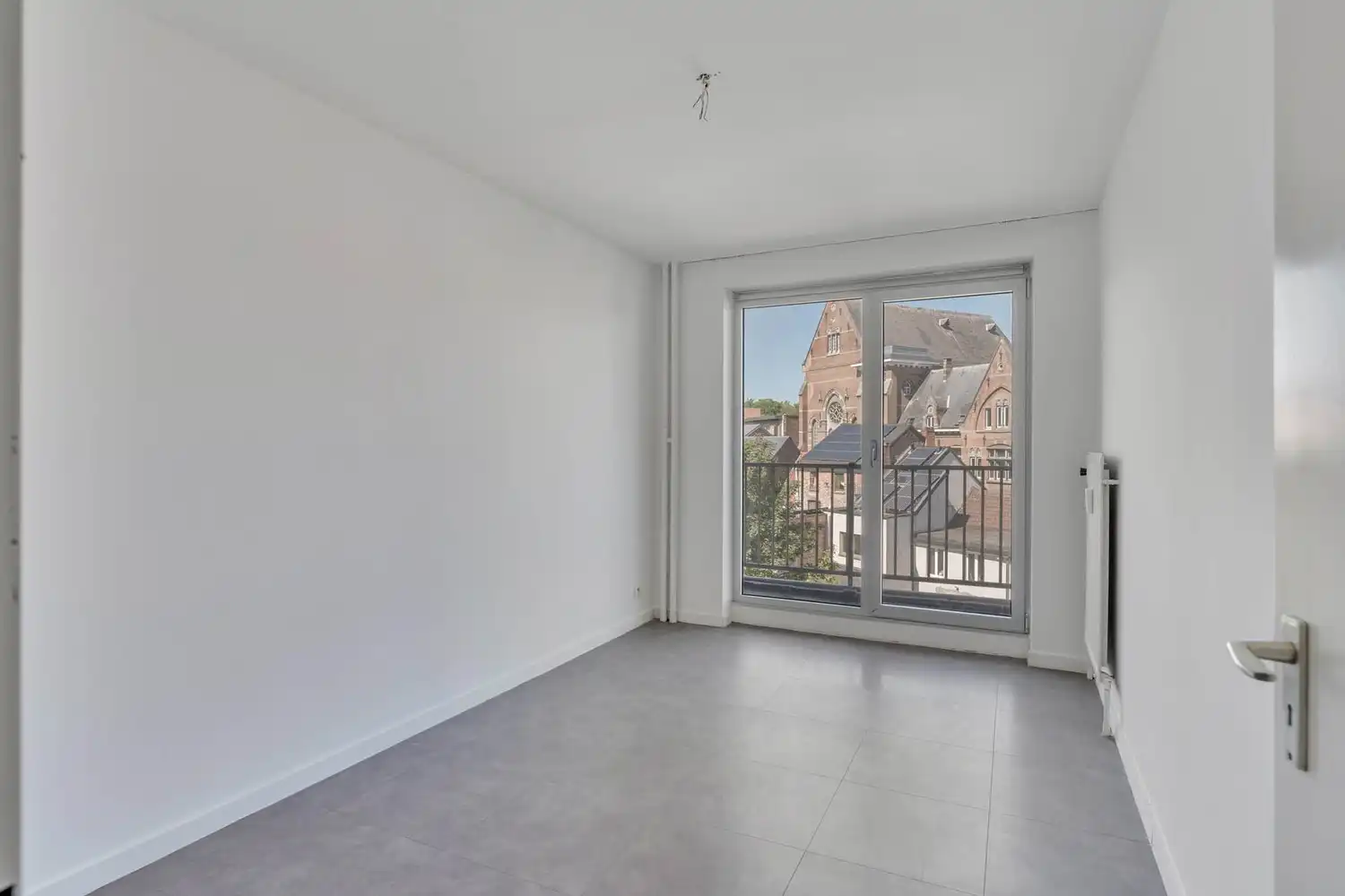 Goed gelegen, lichtrijk en energiezuinig appartement met 2 slaapkamers, een terras en een gemeenschappelijke tuin tegenover de botanische tuin en nabij het UZ Gasthuisberg te centrum Leuven! foto 17