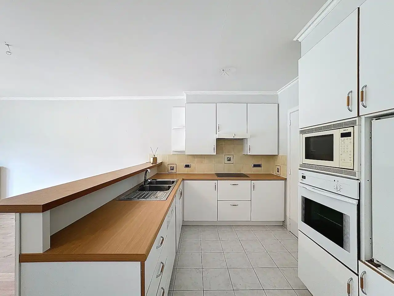 Ruim en lichtrijk appartement gelegen op de tweede verdieping van een goed onderhouden residentie foto 12