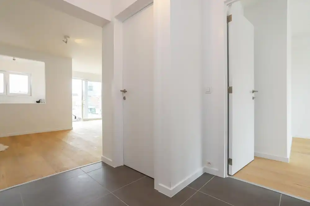 Lichtrijk en energiezuinig 2-slaapkamerappartement met lift, terras en kelderruimte foto 6