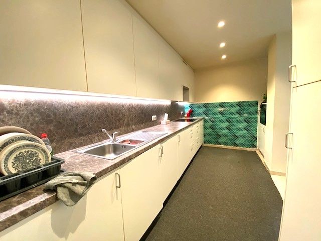 Recent ideaal gelegen volledig gerenoveerd appartement HARTJE Geel 2 slpk, met autostaanplaats foto 5