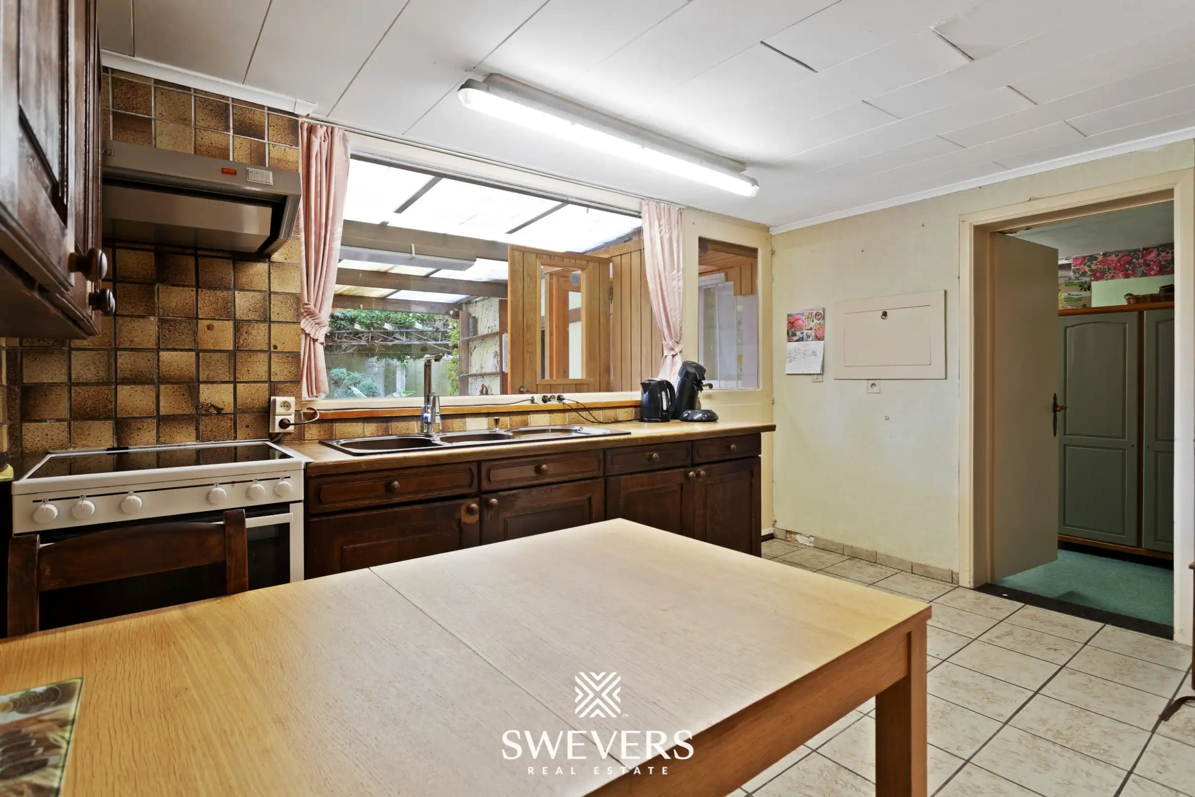 Zeer solide woning met renovatiepotentieel op 10a 18ca  foto 8