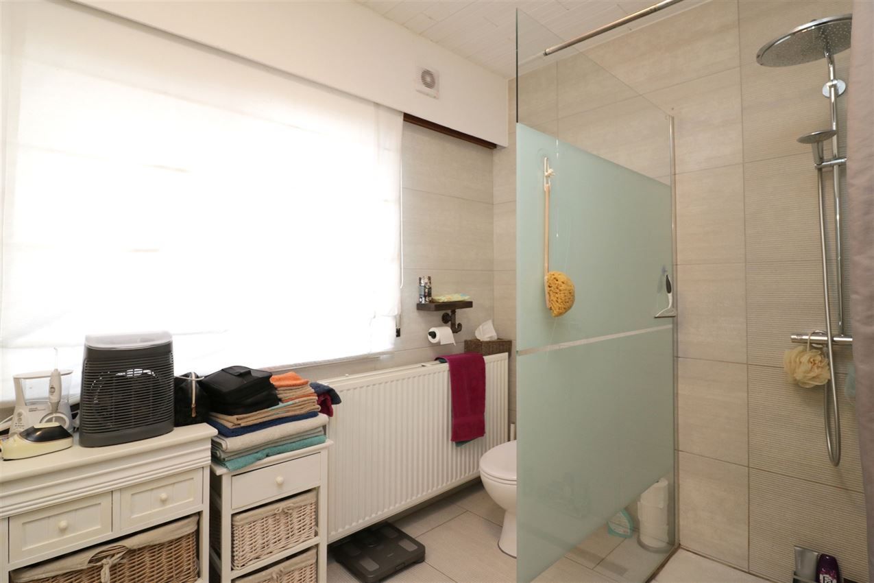 Gezellige woning, 4 slpk., inpandige garage, tuin foto 14