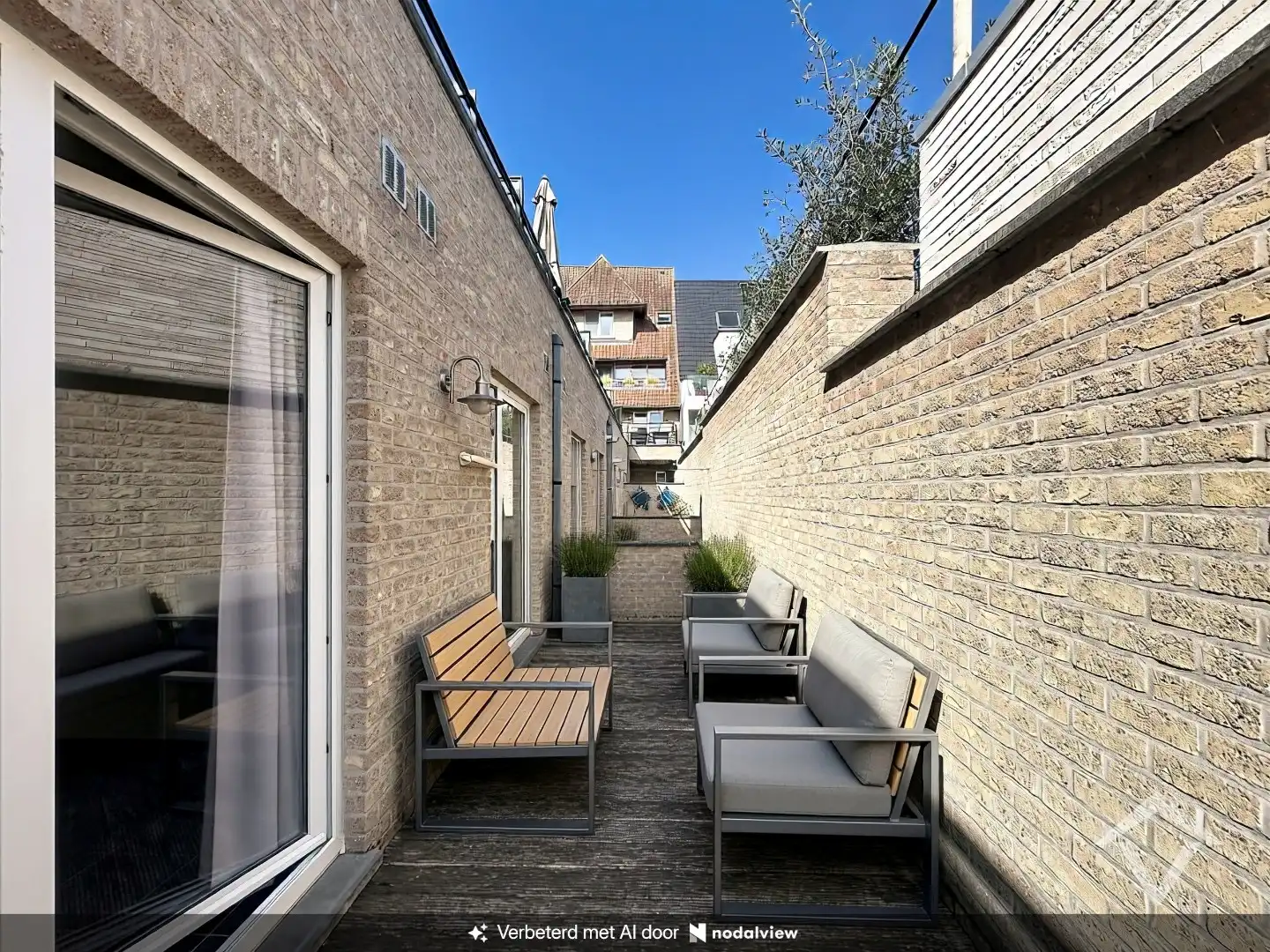 Instapklaar gelijkvloers appartement met twee slaapkamers, terras en ondergrondse parkeerplaats.  foto 17