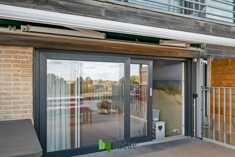 Studio met ruim zonnig terras van 16m², duinenzicht alsook zicht op de Rotonde en zee! foto 5