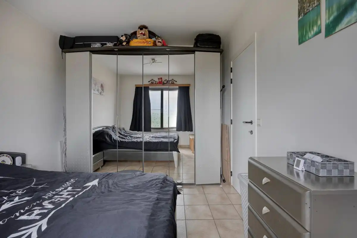 Opbrengsteigendom met 3 appartementen en 7 garages foto 28