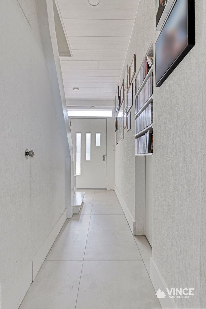Woning met ruim magazijn foto 7