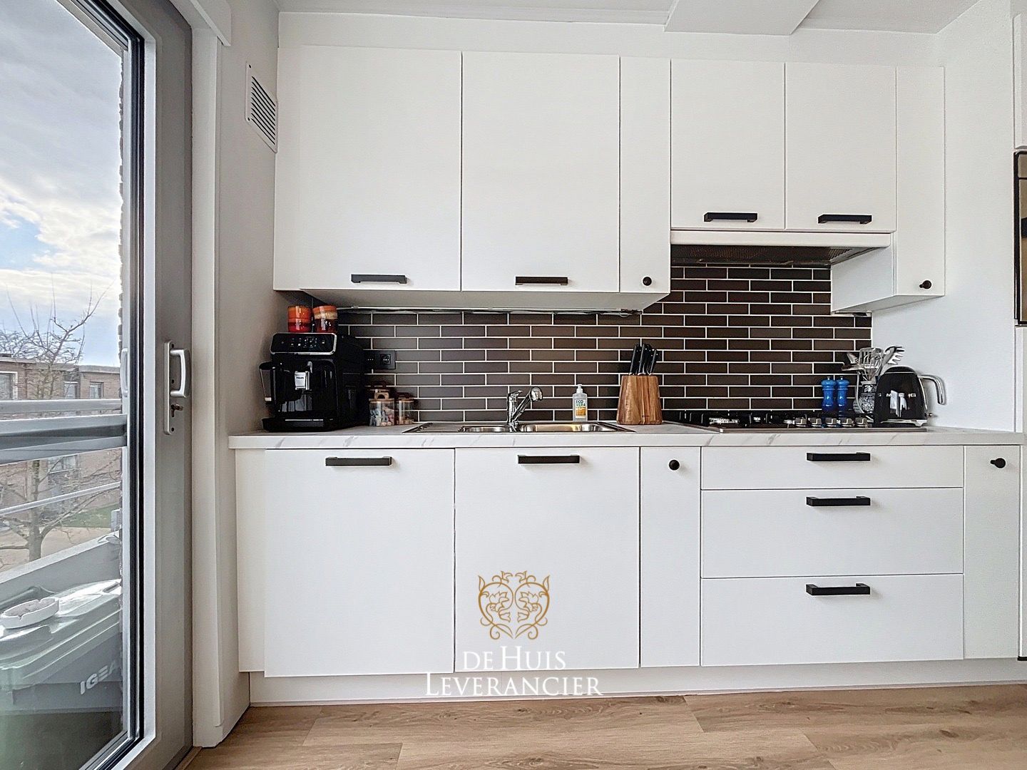 Gerenoveerd appartement met 2 slaapkamers, garagebox en berging te koop in Edegem foto 7