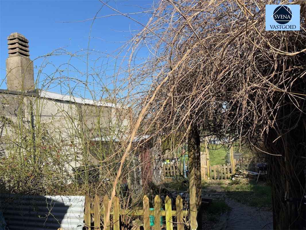 WONING GELEGEN NABIJ CENTRUM HERZELE foto 11