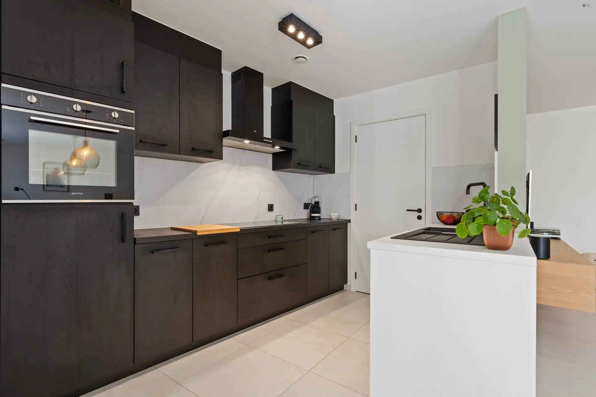 Luxueus afgewerkt gelijkvloers appartement te centrum Stekene foto 7