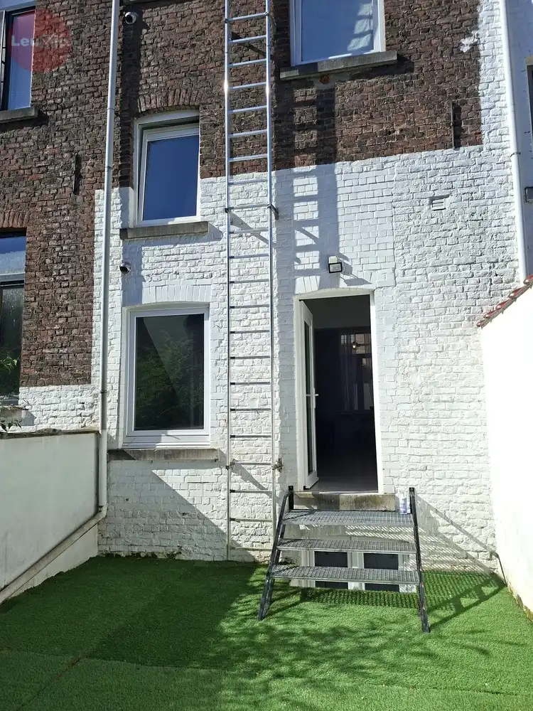 Instapklaar 1-slaapkamerappartement met tuin in het stadscentrum foto 9