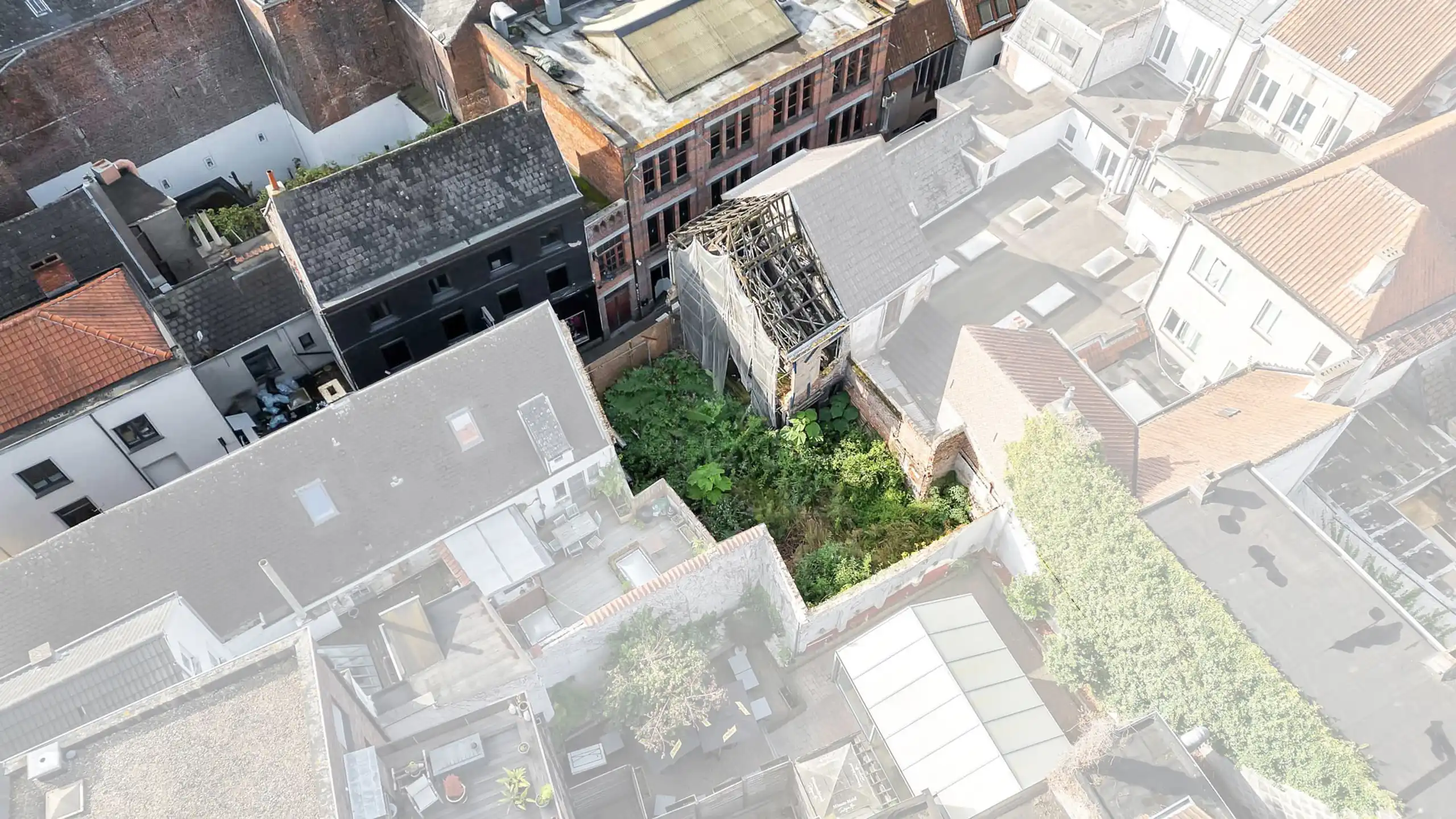 Grond met mogelijkheden centrum Aalst foto {{pictureIndex}}