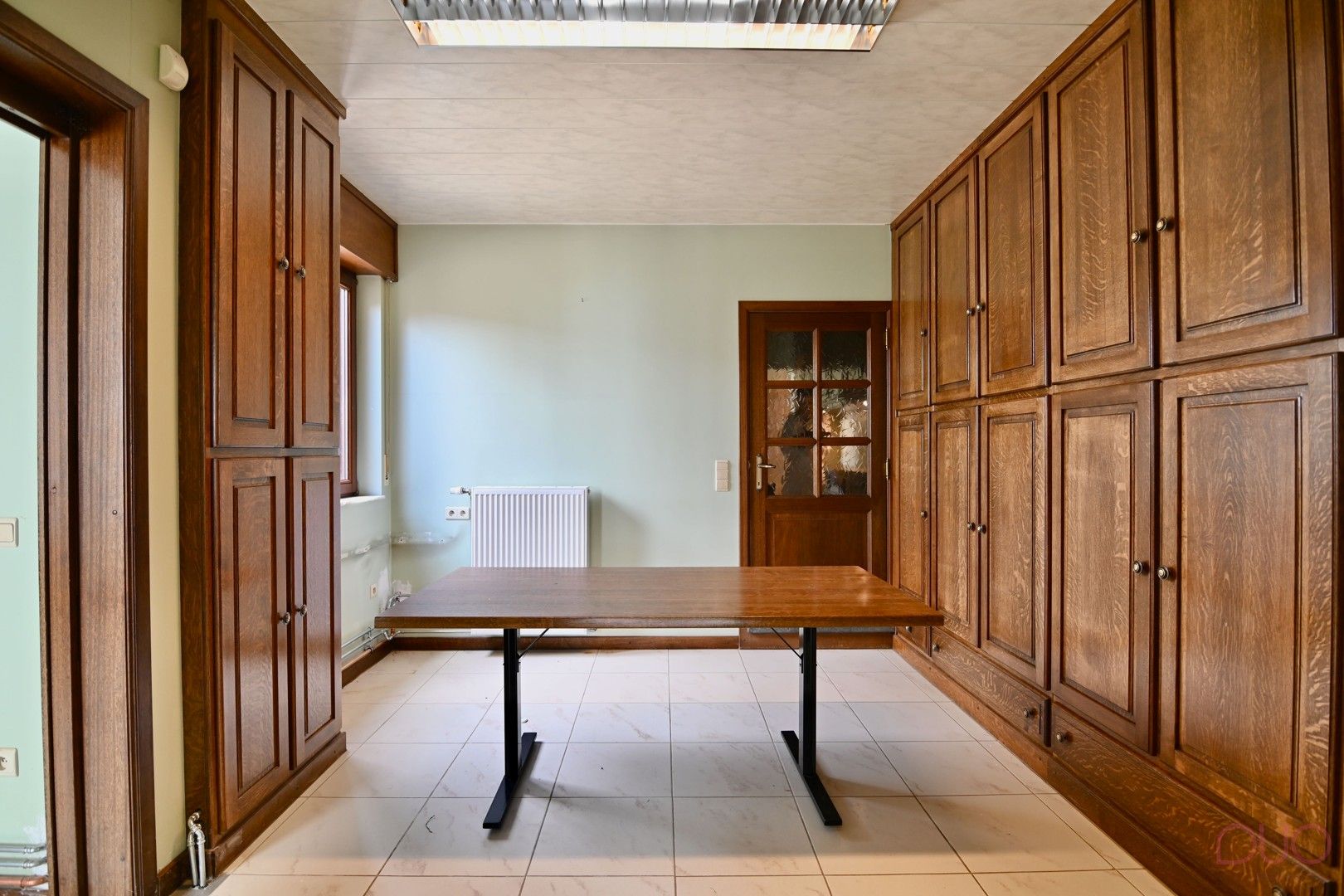Gelijkvloerse  woning met 1 slaapkamer (optioneel 2) met achterliggend 2 garages nabij het centrum van Tongeren foto 6