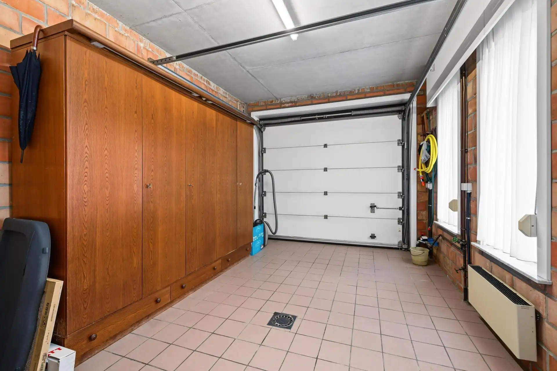 Uitstekend gelegen gezinswoning met 4 slaapkamers + bureau en ruime garage foto 12