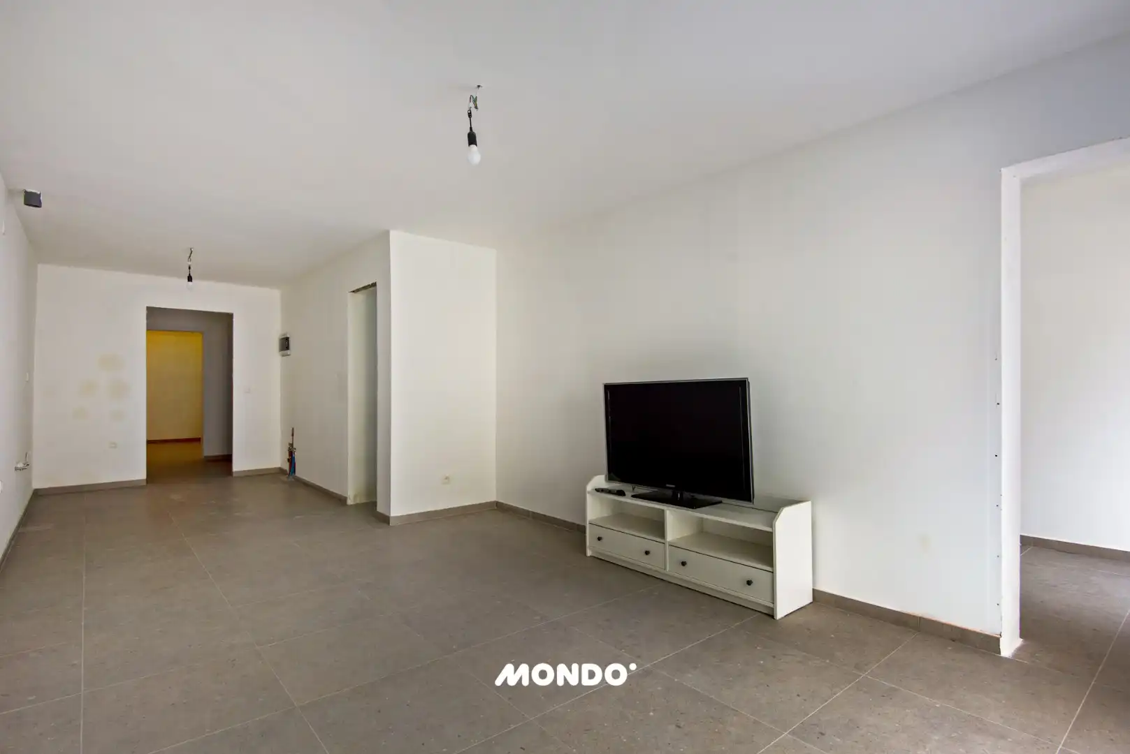 Commercieel gelegen opbrengsteigendom met handelsgelijkvloers, appartement en studio in het centrum van Willebroek! foto 7