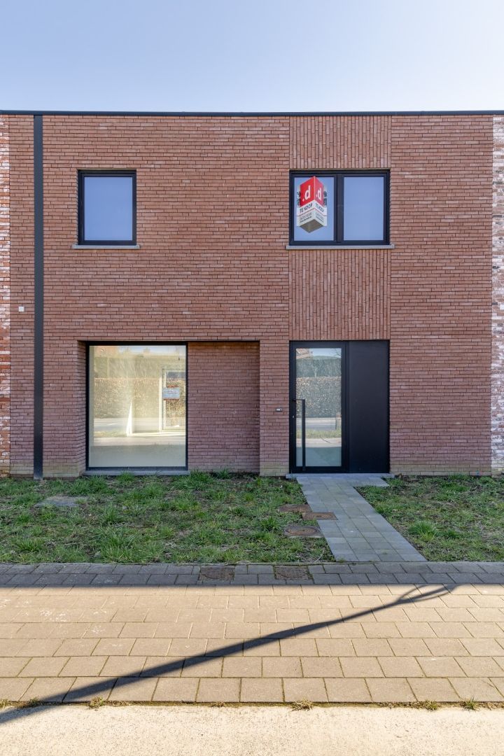 Energiezuinige stadswoning met 3 slpk's, carport en zuid gerichte tuin foto 2