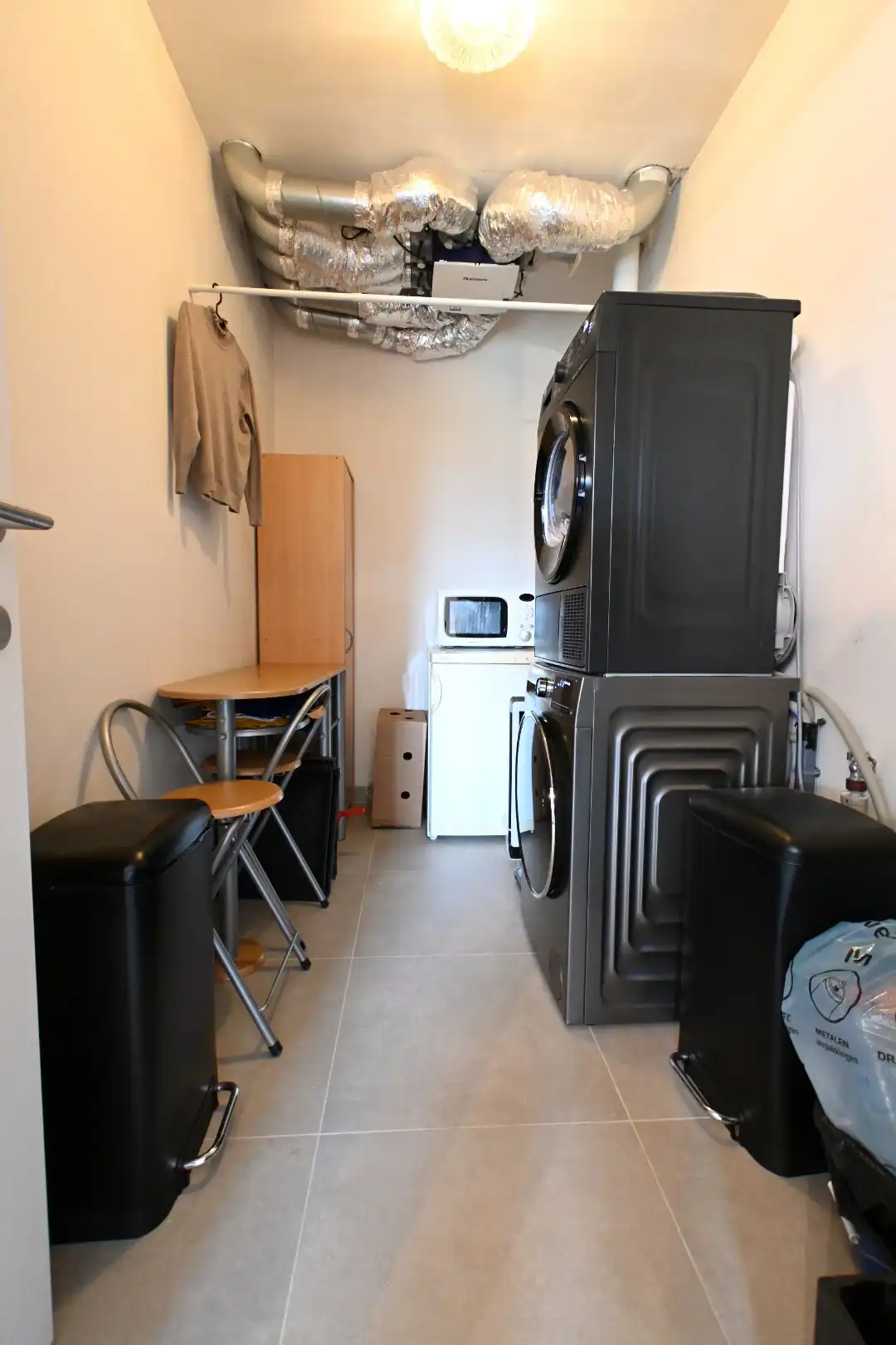 Knap afgewerkt gelijkvloers appartement met 2 slaapkamers, ruim terras, tuintje, carport en berging - GEEN GEMEENSCHAPPELIJKE ONKOSTEN  foto 5