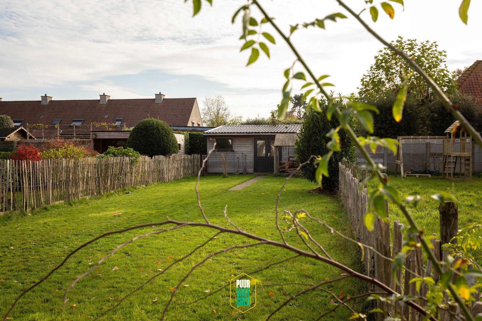 Karaktervolle half open woning met grote, zongerichte tuin, twee slaapkamers en berging in het hartje van Sint-Andries. foto 26