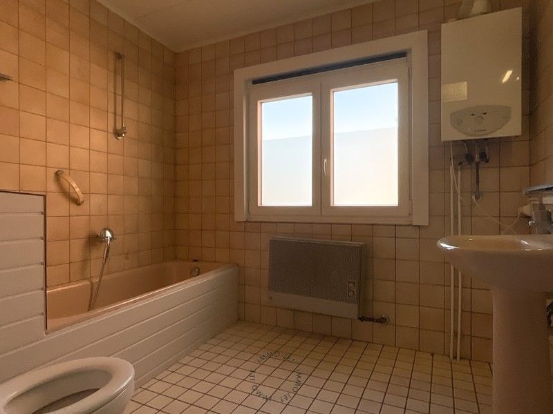 Woning met 2 slaapkamers en koer in het centrum van Sint-Gillis-Waas foto 8